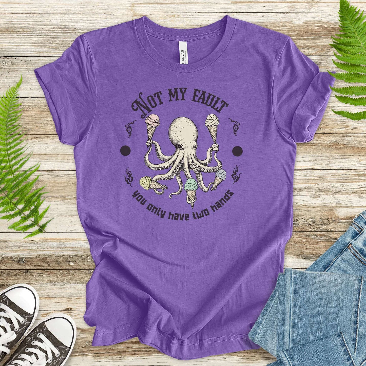 Funny octopus T-shirt in purple with ice cream design, perfect for animal lovers and humor enthusiasts.