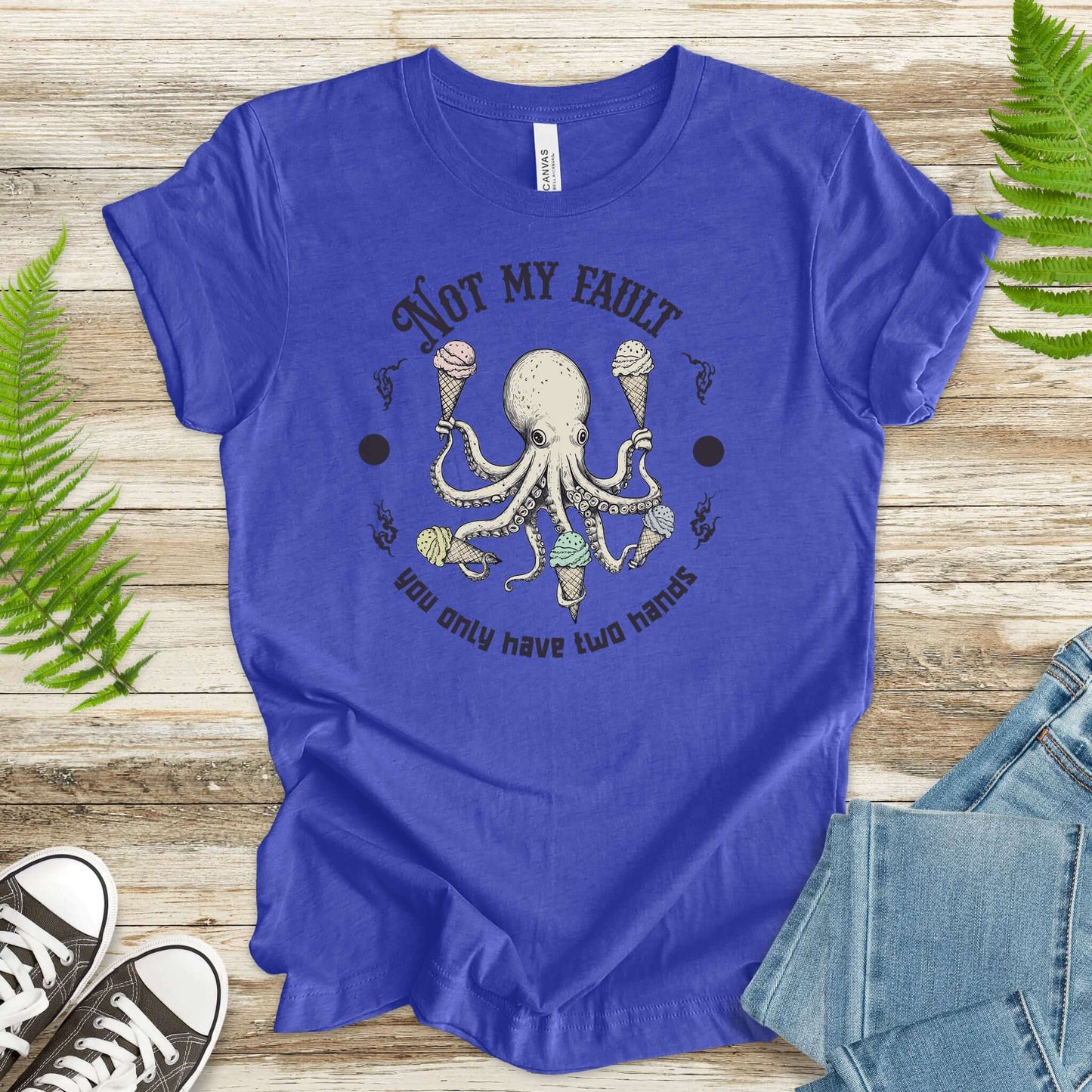 Funny octopus ice cream lover T-shirt in blue, featuring humor about having eight arms for ice cream.