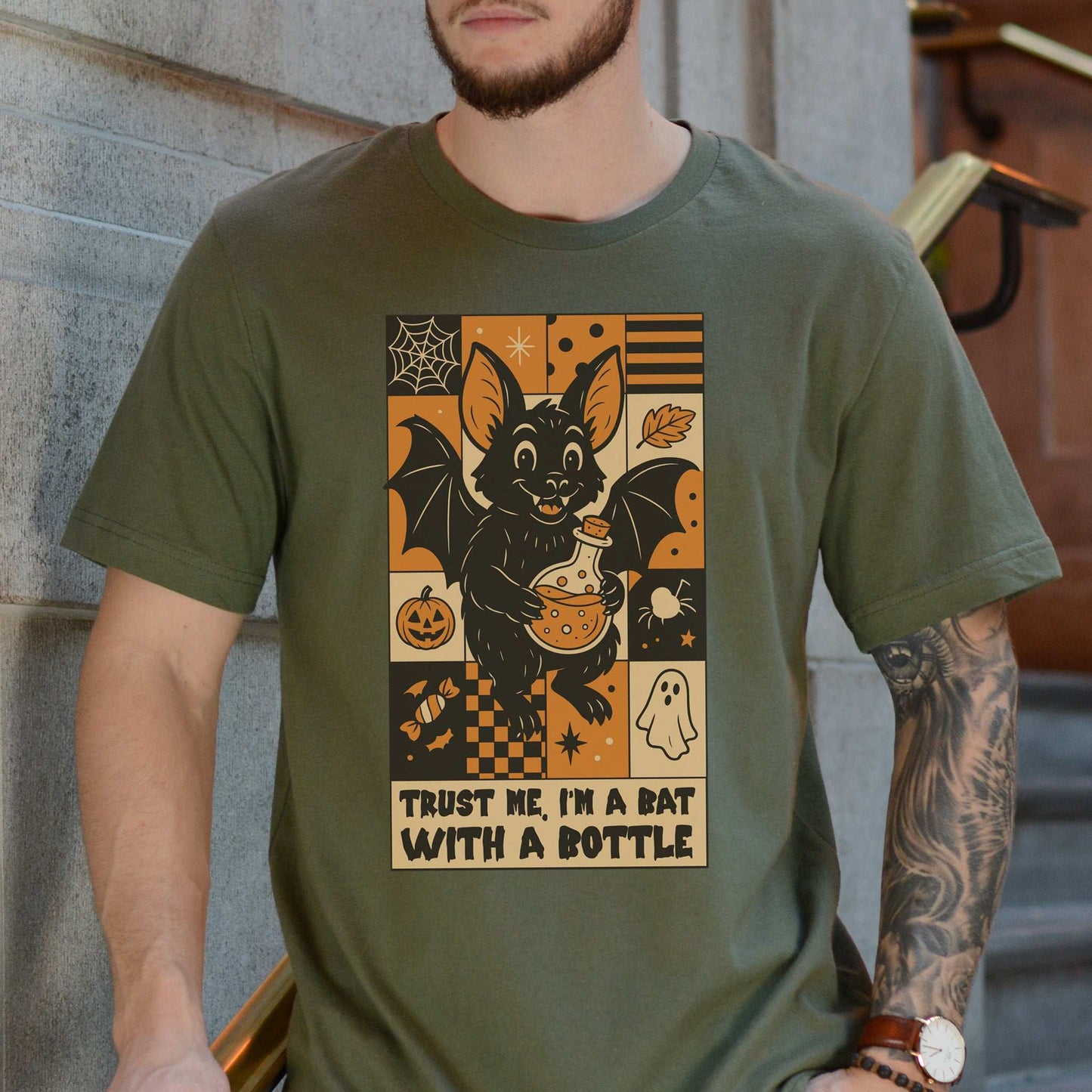 Potion Bat Halloween T-shirt featuring a cute bat with a bottle, perfect for spooky season and retro fans.