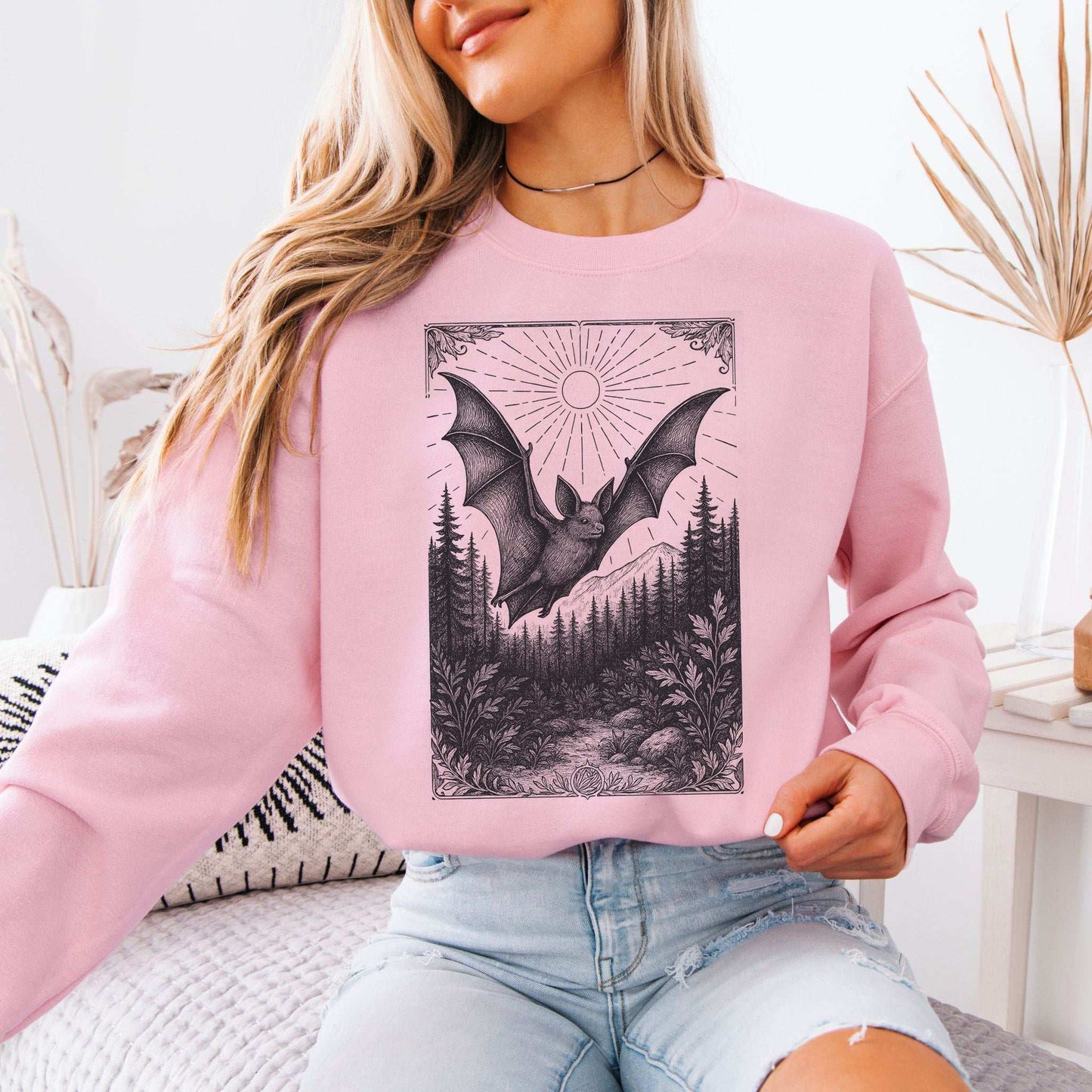 Nocturnal Guide bat spirit animal sweatshirt featuring vintage bat design over forest scenery.
