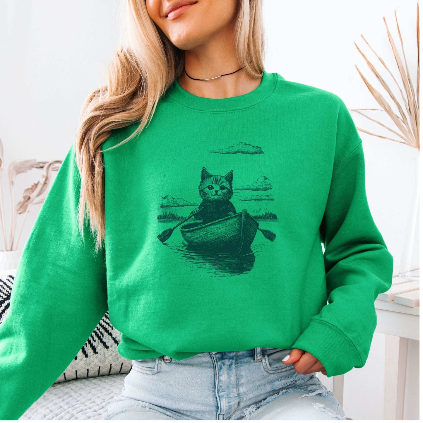 Mysterious Rowboat Cat Sweatshirt – Surreal Moody Art Style