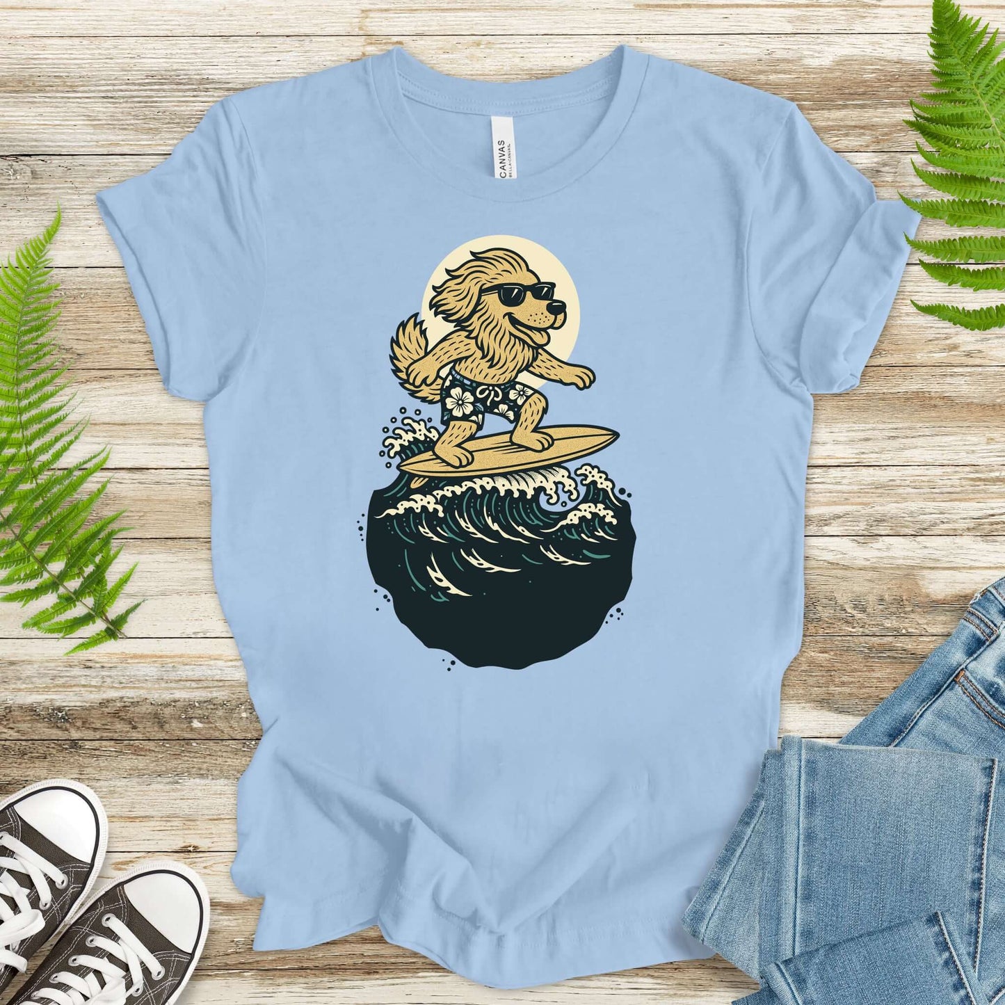 Light blue shirt featuring a cool dog in sunglasses surfing on a wave, perfect for fantasy lovers and animal enthusiasts.
