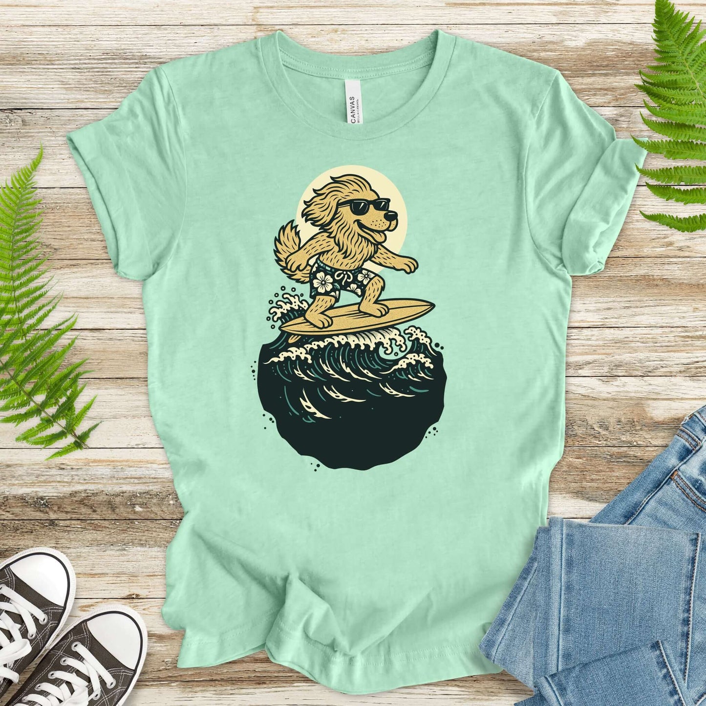 Surfing dog in shades on a wave t-shirt, perfect for fantasy lovers and animal enthusiasts.