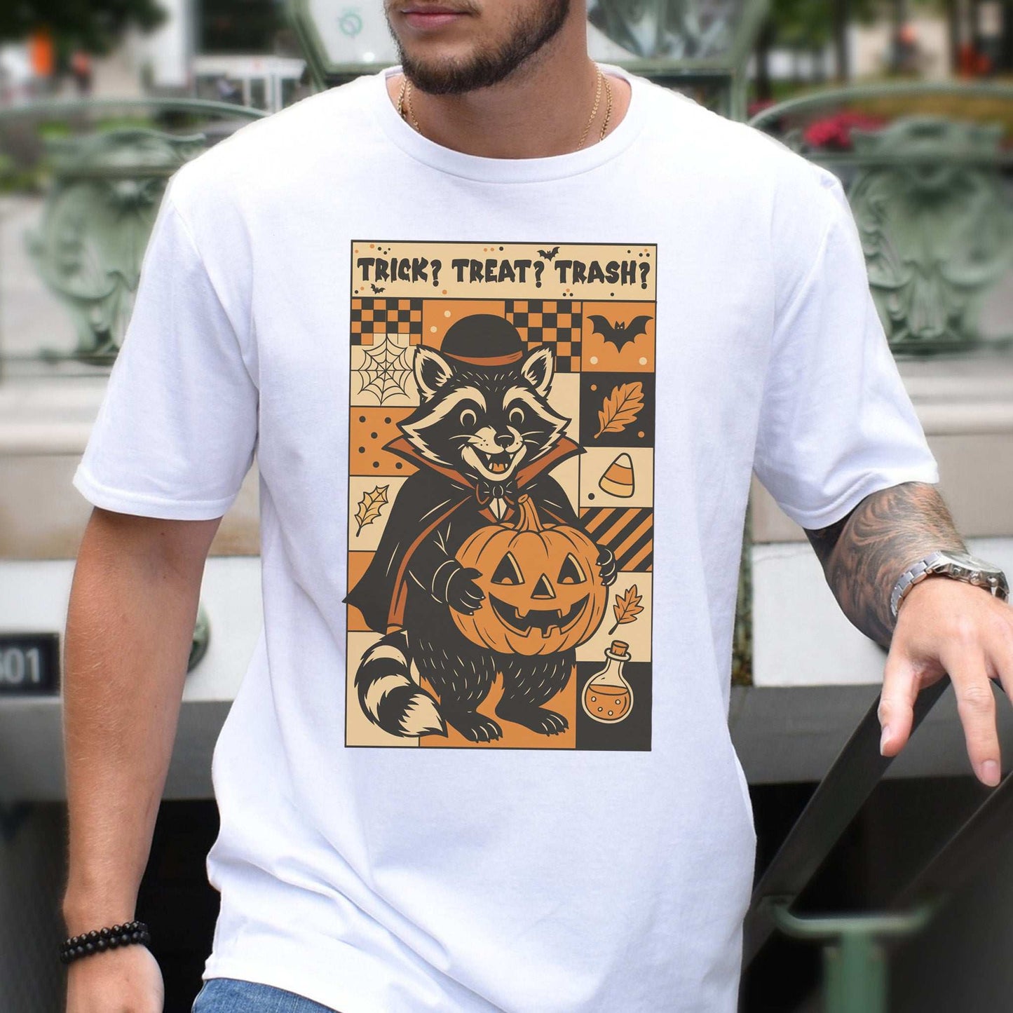 Dracula Raccoon Halloween T-shirt featuring a retro design with Trick? Treat? Trash? on a white shirt.