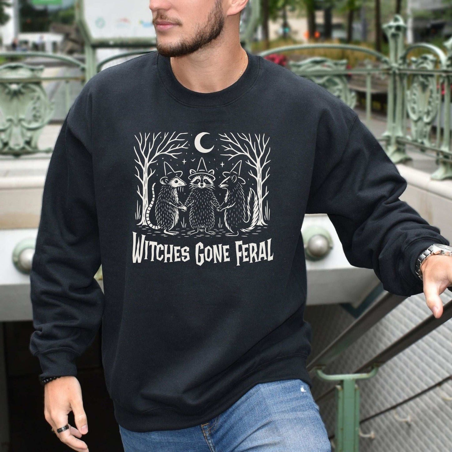 Witches Gone Feral Halloween Sweatshirt – Raccoon, Opossum & Skunk Coven Vibes