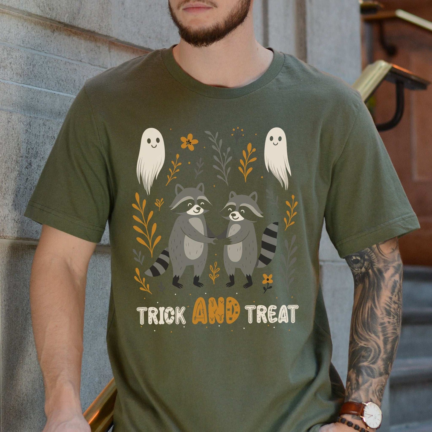 Trick AND Treat Raccoon Halloween T-shirt featuring cute raccoons and friendly ghosts.