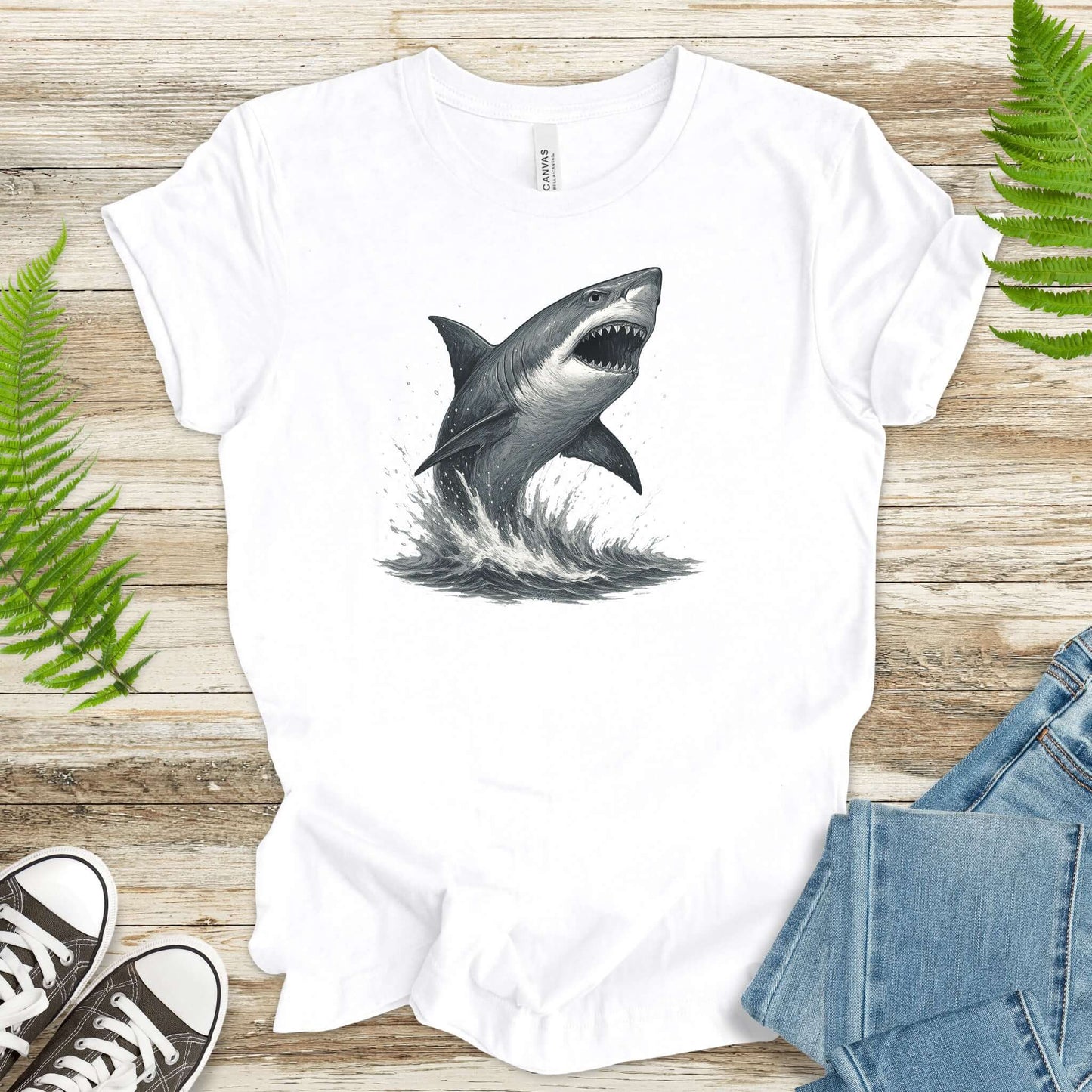 Great White Shark T-Shirt featuring a shark breaching the ocean, perfect for shark lovers and ocean enthusiasts.