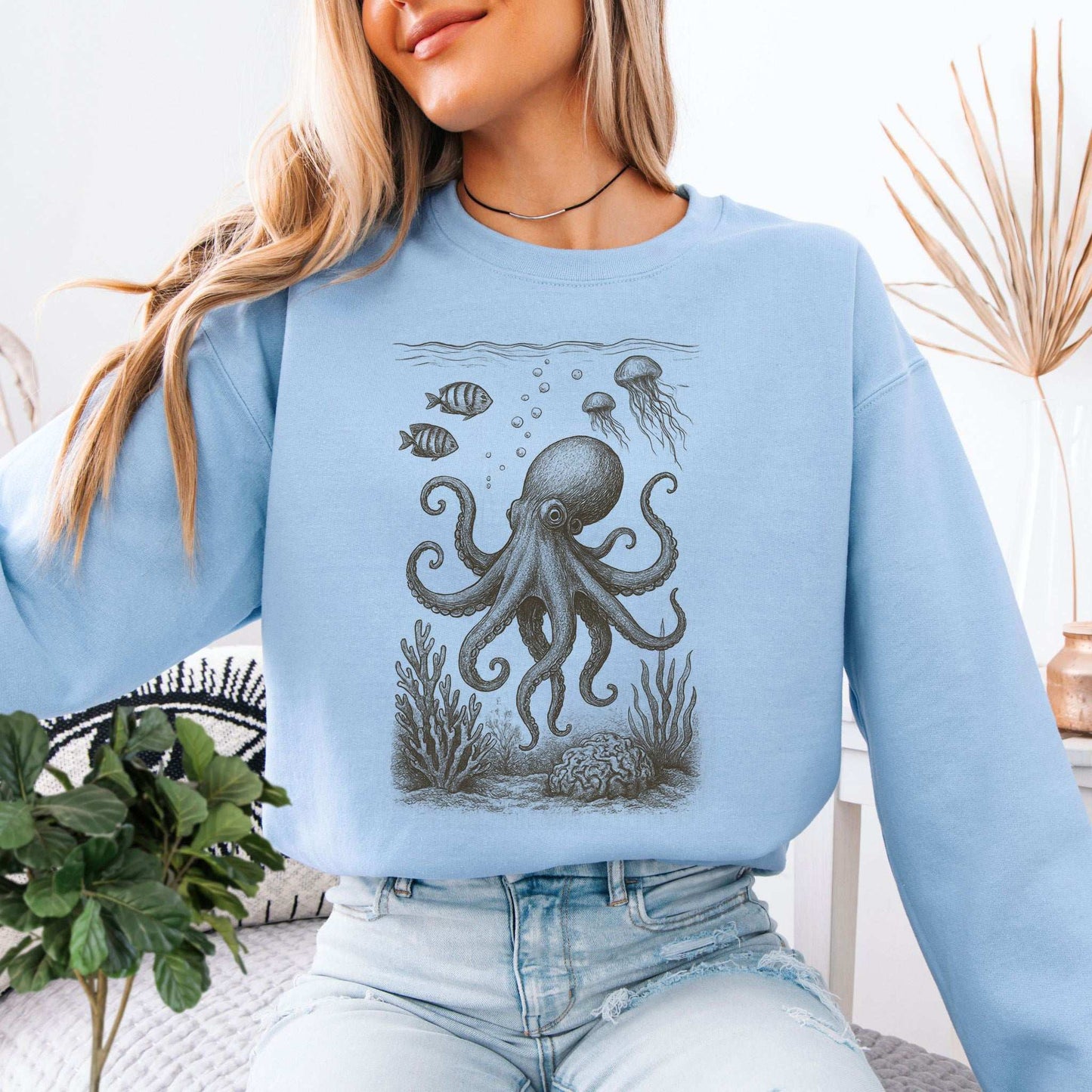Octopus & Coral Reef Sweatshirt on model showcasing artistic ocean life design, perfect gift for sea lovers.