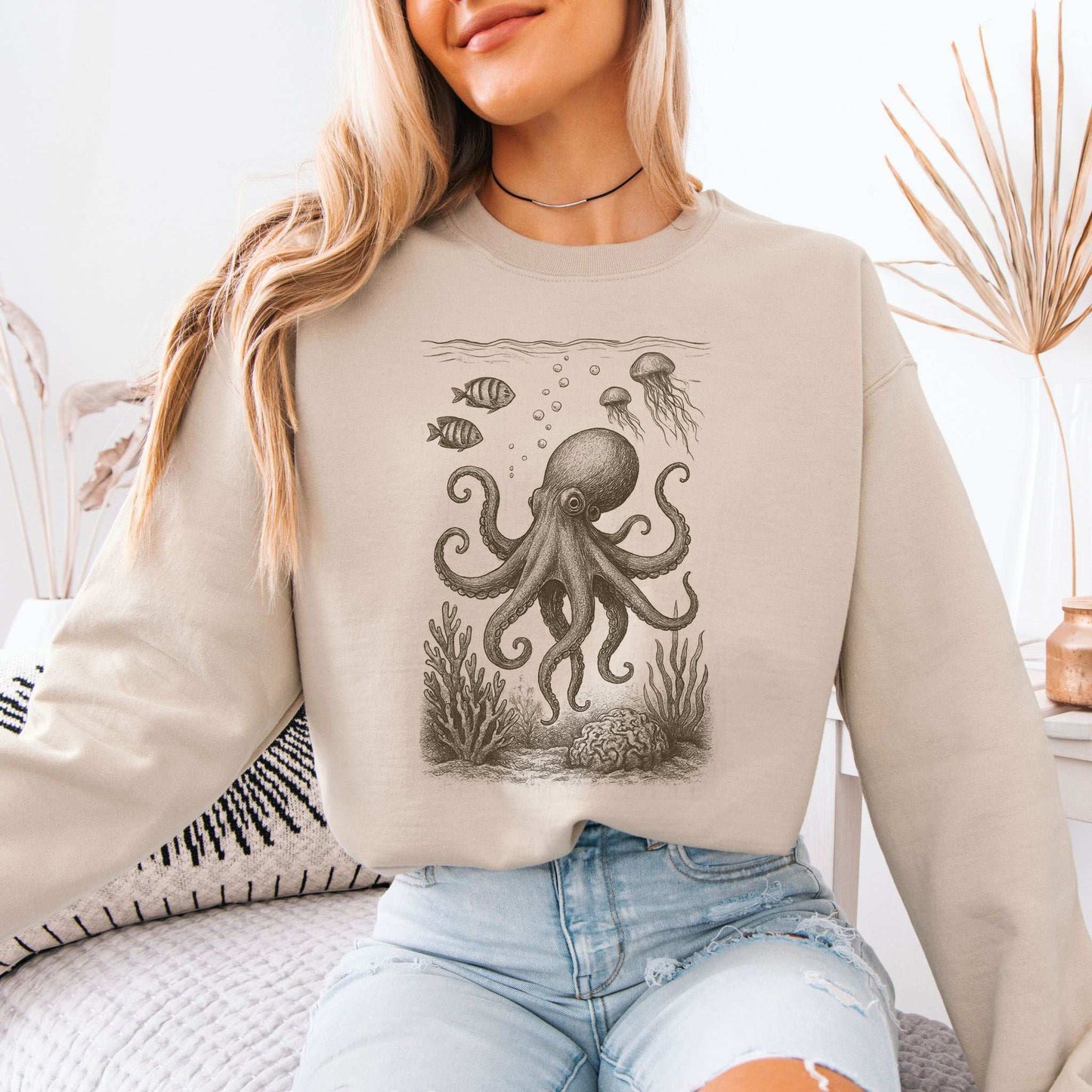 Woman wearing Octopus & Coral Reef Sweatshirt featuring artistic ocean life design for sea lovers.