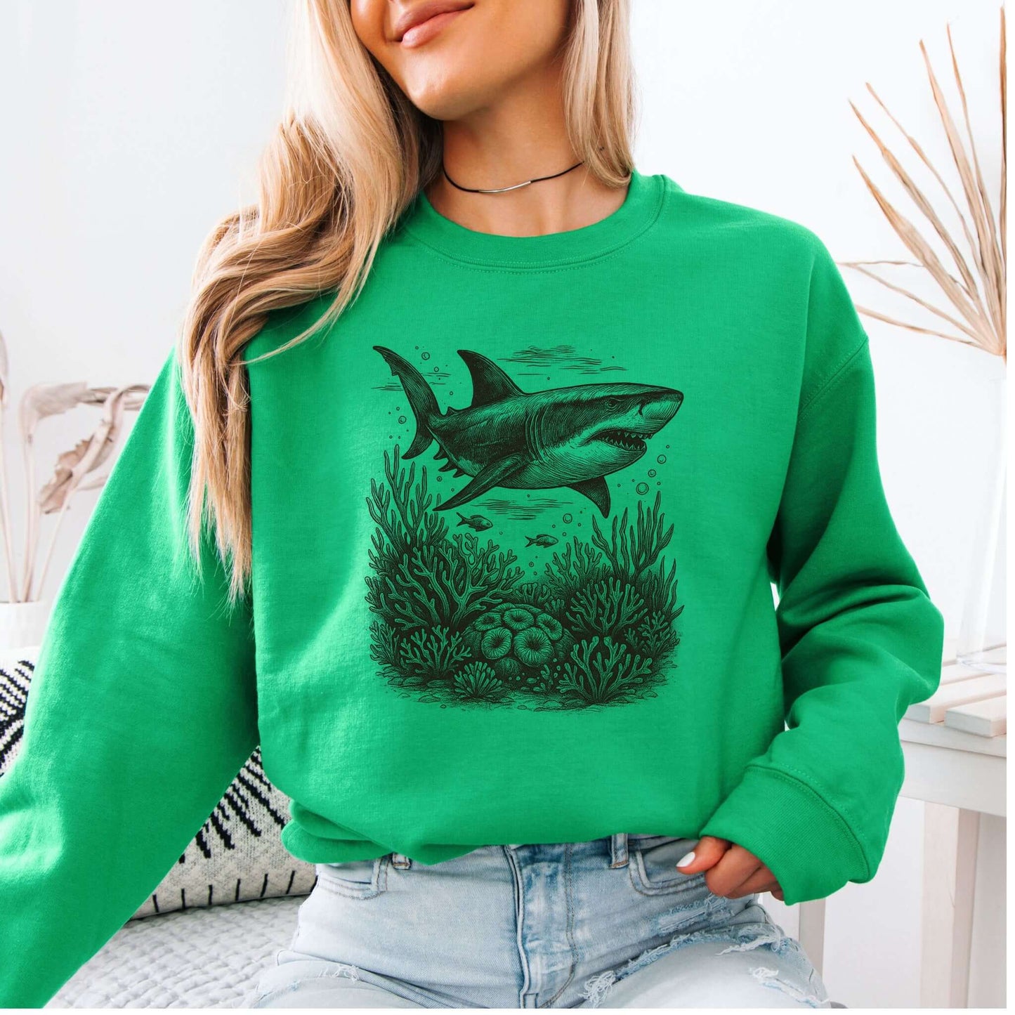 Shark and Coral Reef Sweatshirt showcasing a hand-drawn shark design on a vibrant green background.