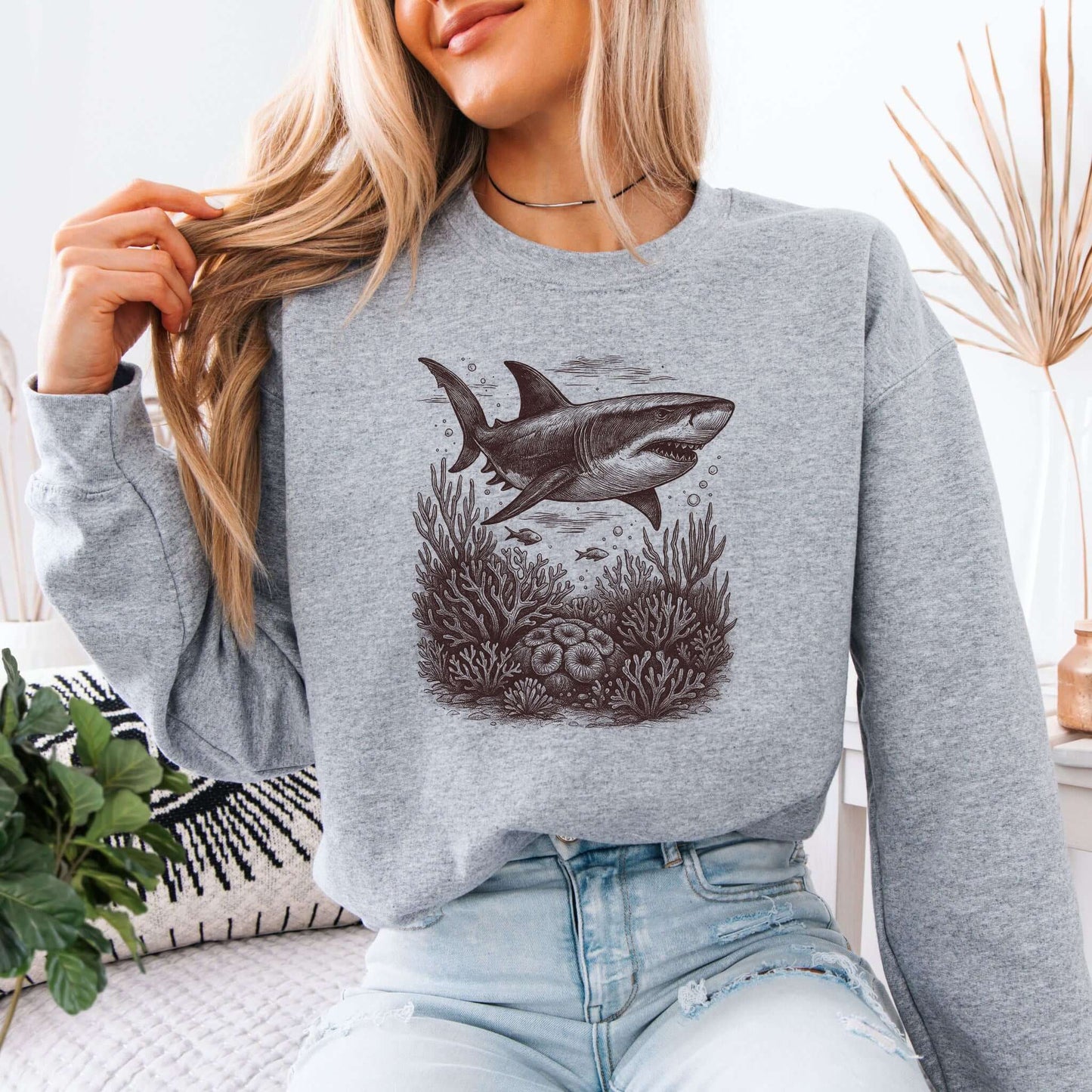 Shark and Coral Reef Sweatshirt featuring a vintage hand-drawn shark design among coral, ideal for shark lovers.