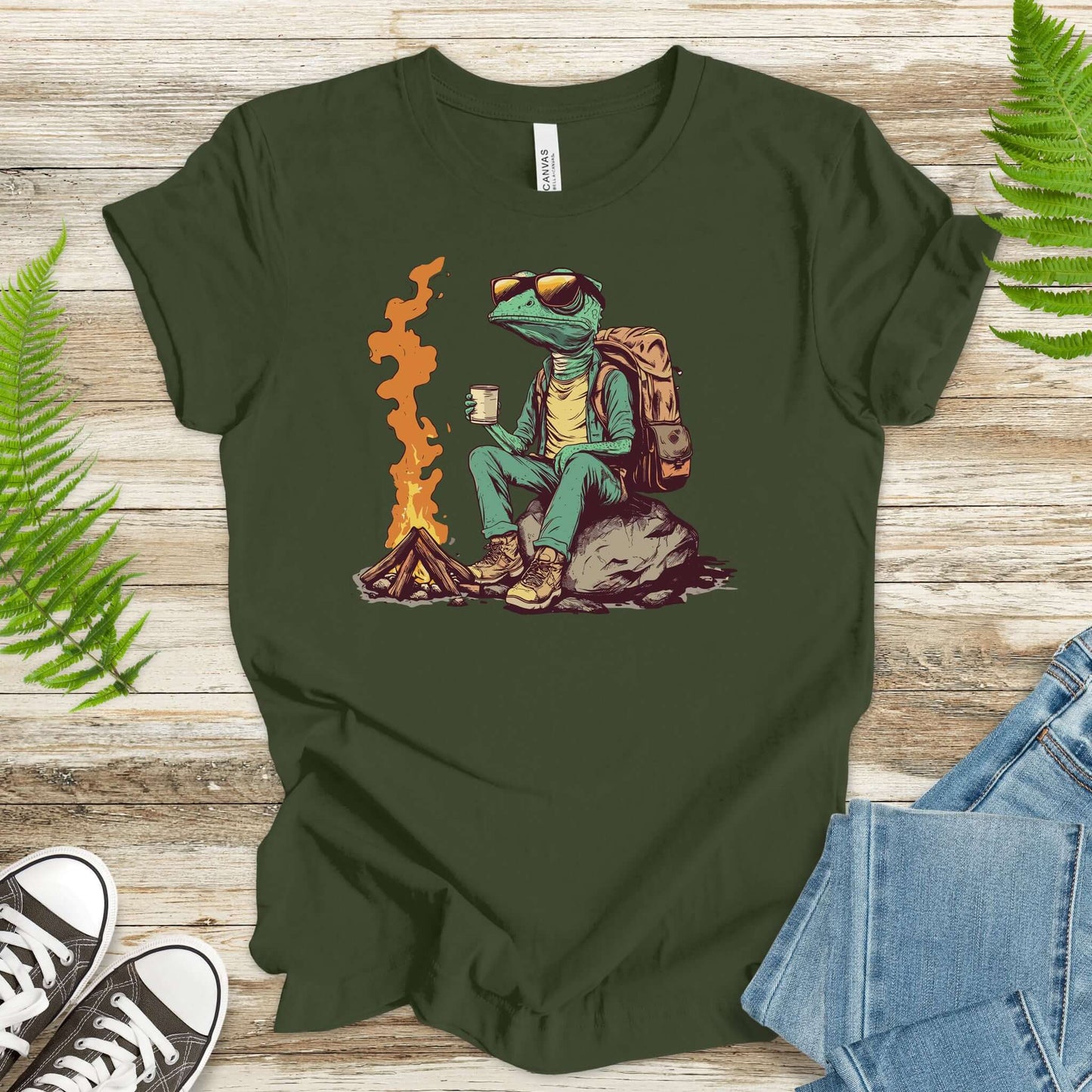 Chameleon sitting near a campfire t-shirt featuring a reptile in hiking gear enjoying a brew.