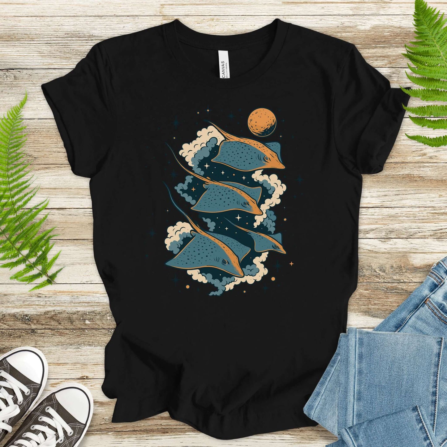 Black fantasy t-shirt featuring flying trigons gliding through space with clouds and a moon.