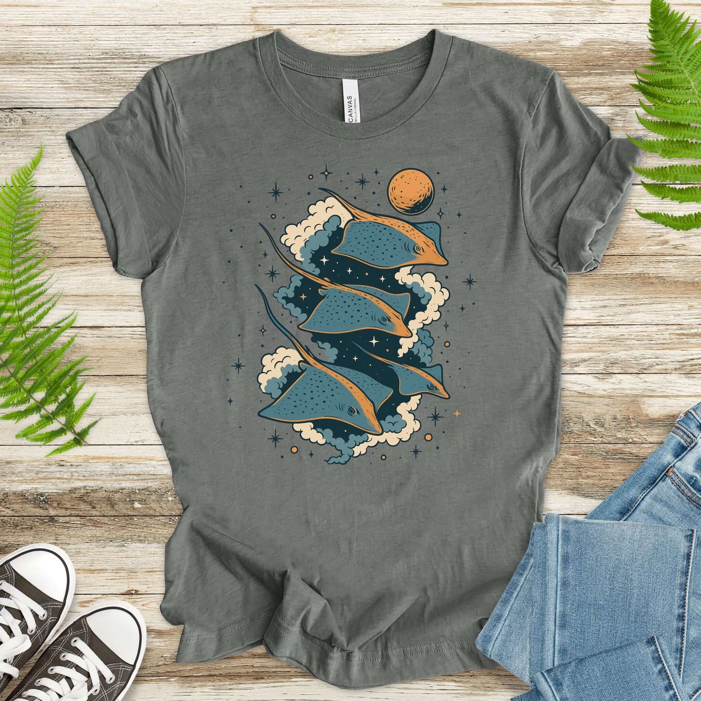 Space Trigons fantasy t-shirt featuring colorful trigons gliding through a cosmic scene, perfect for fantasy lovers.