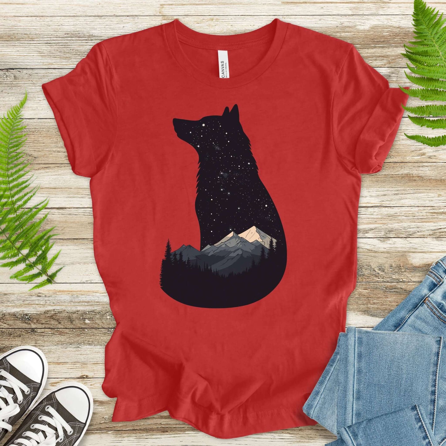 Wolf silhouette t-shirt with night mountain scene and moon, perfect for nature lovers and adventurers.