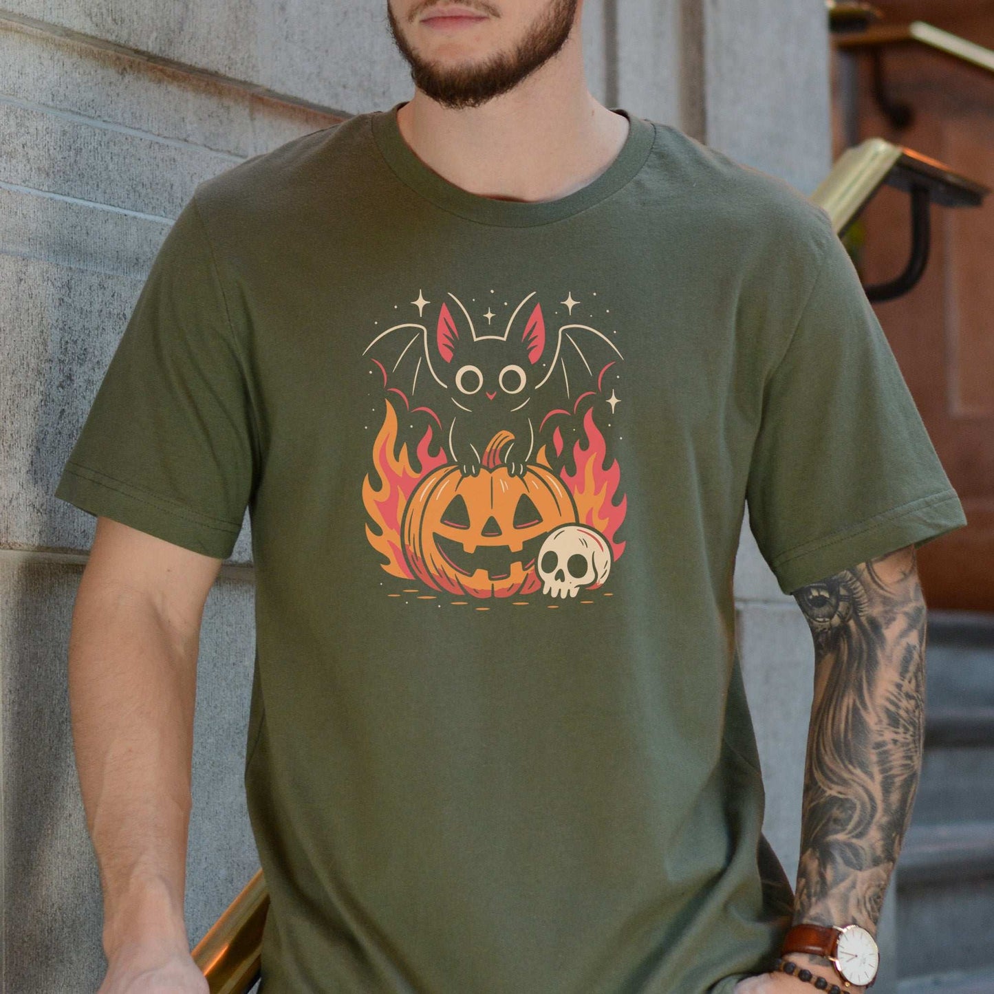 Spooky Bat Halloween T-Shirt with cute bat on a jack-o'-lantern and flames, perfect for goths and pumpkin lovers.