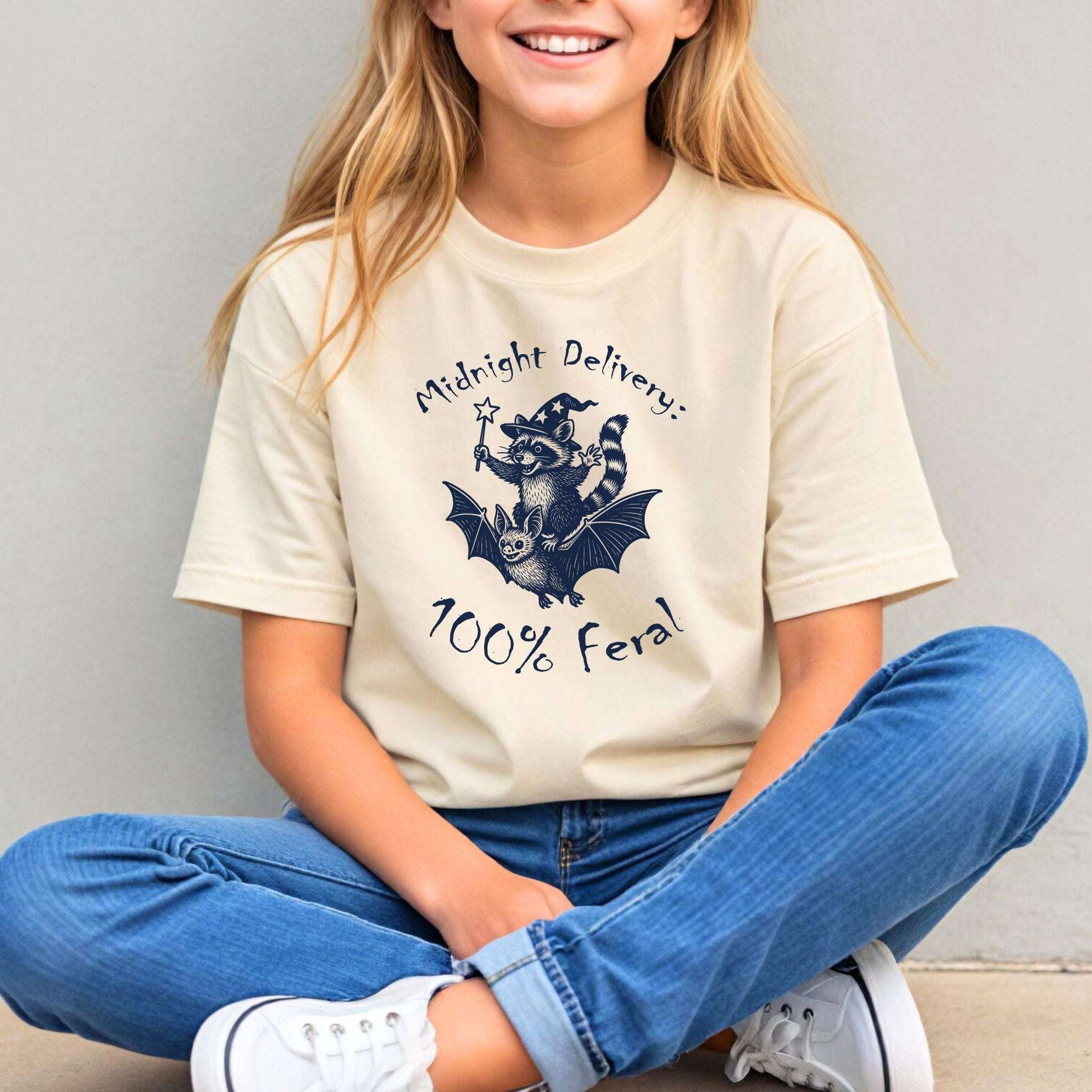 Midnight Delivery Raccoon Halloween Youth Tee – 100% Feral Bat Ride
