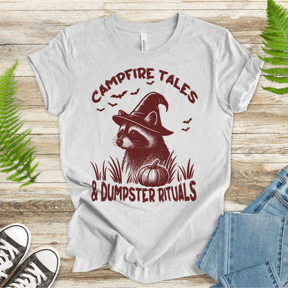 Campfire Tales Raccoon Halloween T-shirt with witch hat and pumpkin design for spooky vibes.