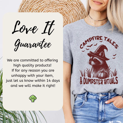 Campfire Tales Raccoon Halloween T-shirt featuring a playful raccoon in a witch hat with a pumpkin.
