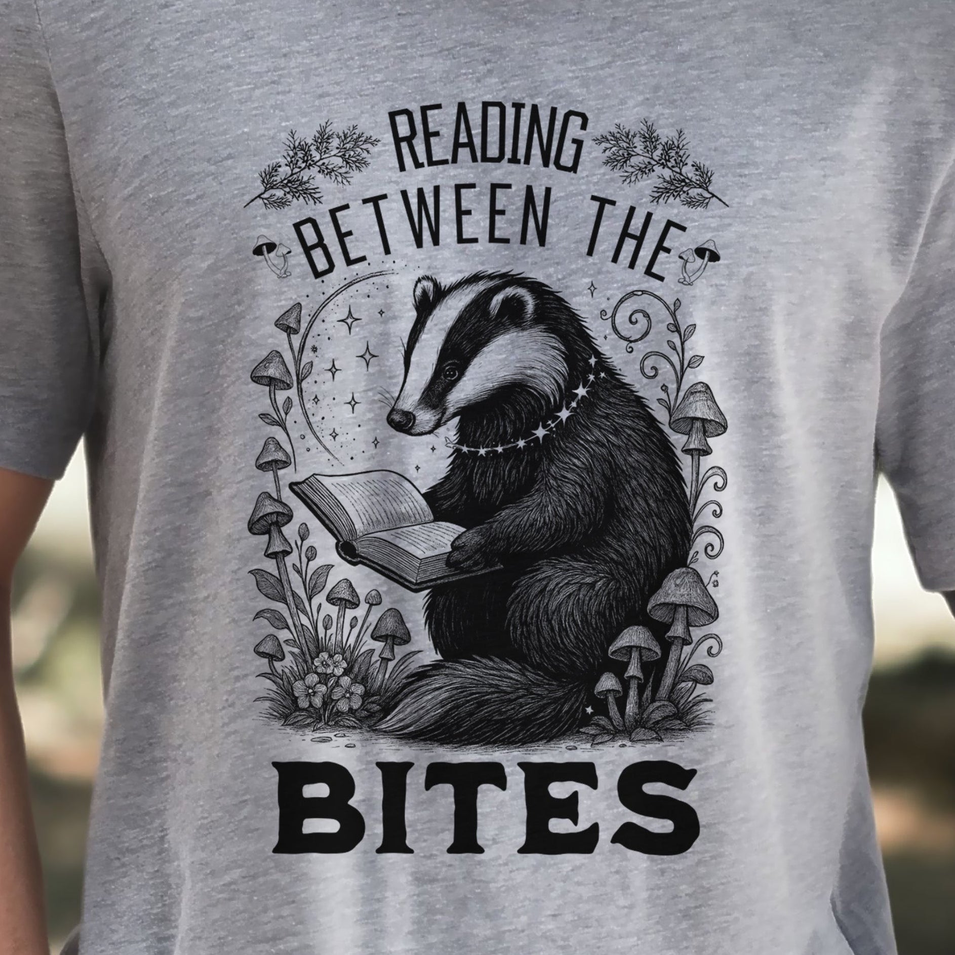 Badger Reading Between the Bites T-Shirt