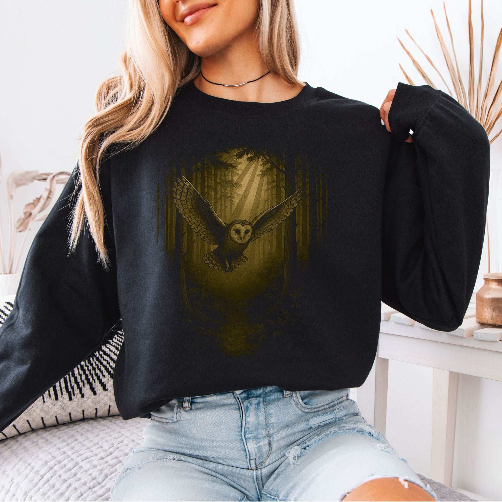 Barn Owl Spirit Animal Sweatshirt – Mystical Forest Flight worn by model, featuring owl design in a dark forest setting.