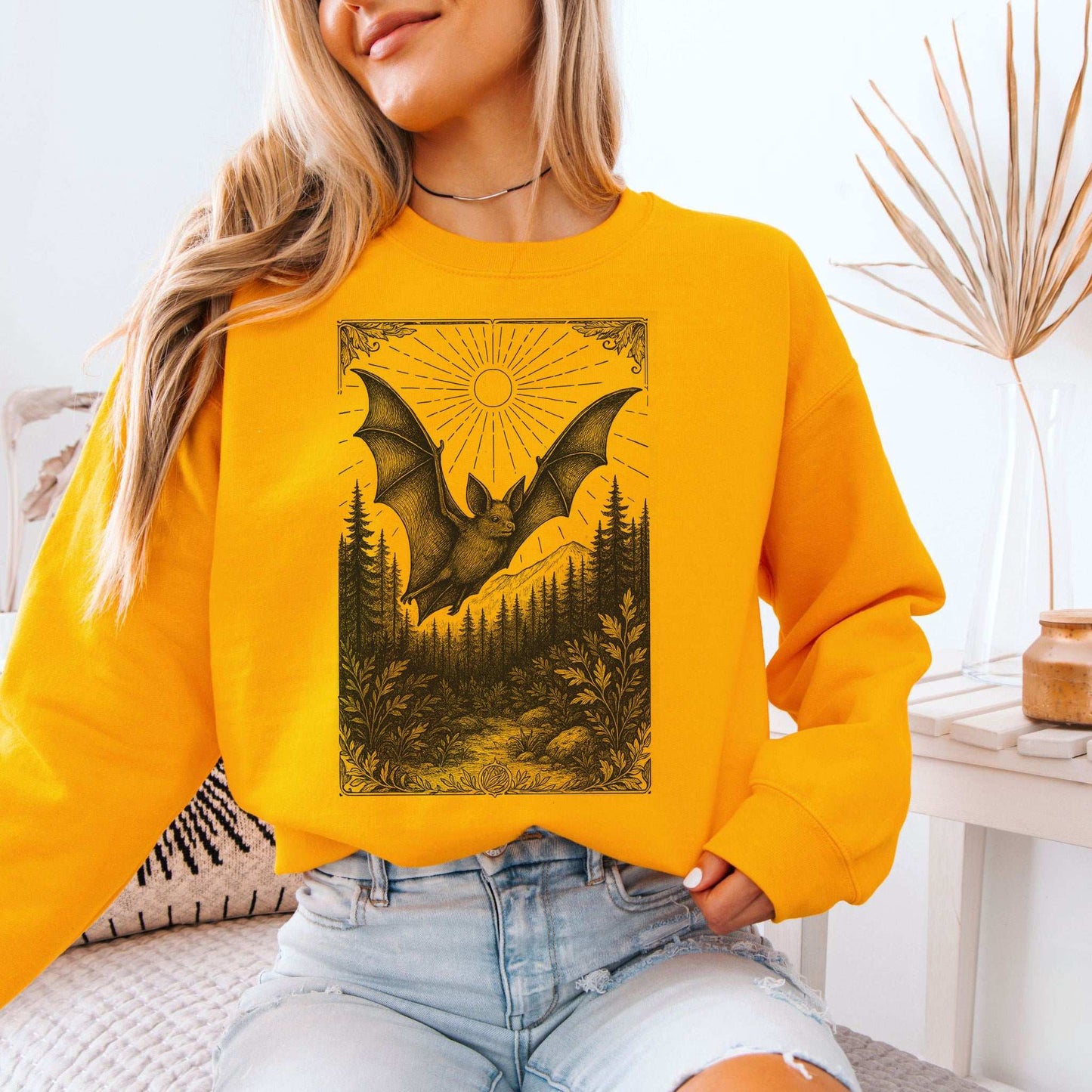 Nocturnal Guide bat spirit animal sweatshirt featuring a mystical bat design and forest scenery.