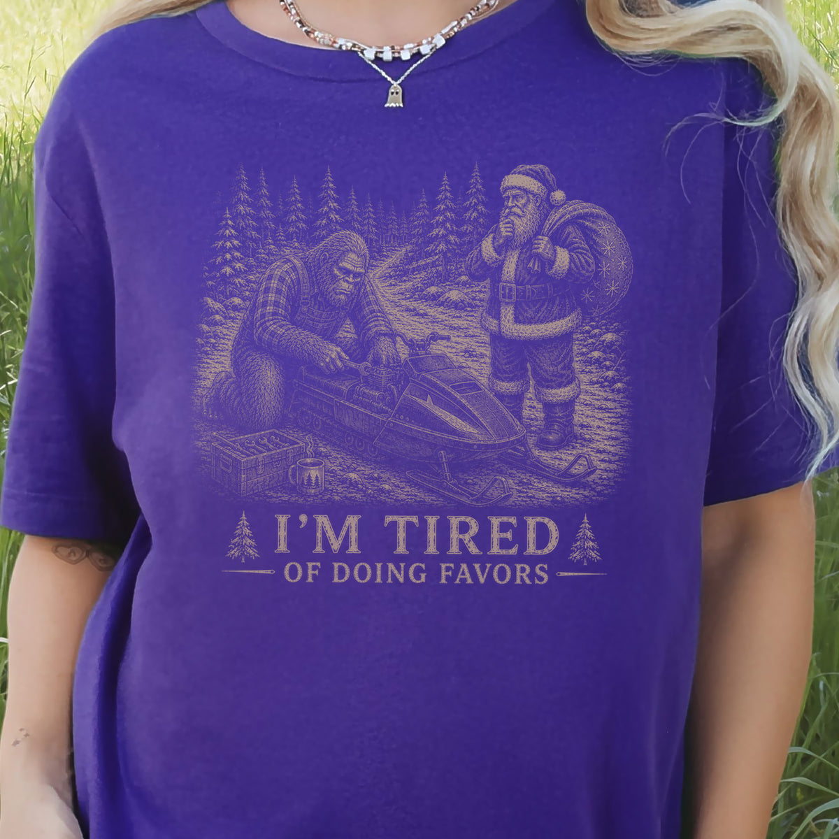 I’m Tired of Doing Favors T-Shirt – Bigfoot Fixing Santa Snowmobile Tee