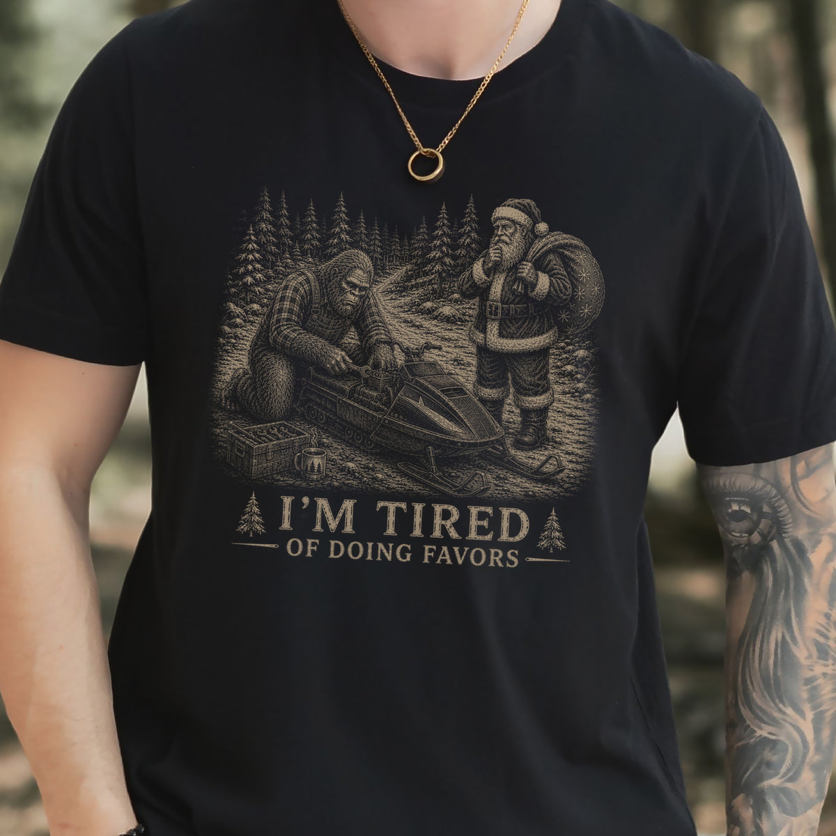 I’m Tired of Doing Favors T-Shirt – Bigfoot Fixing Santa Snowmobile Tee