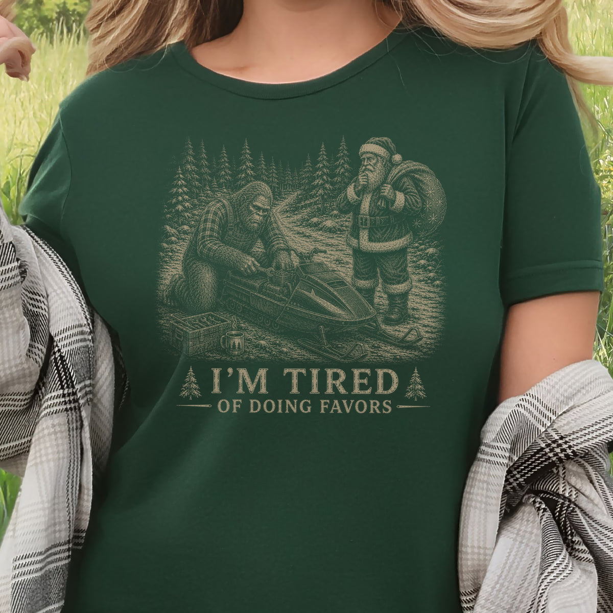 I’m Tired of Doing Favors T-Shirt – Bigfoot Fixing Santa Snowmobile Tee