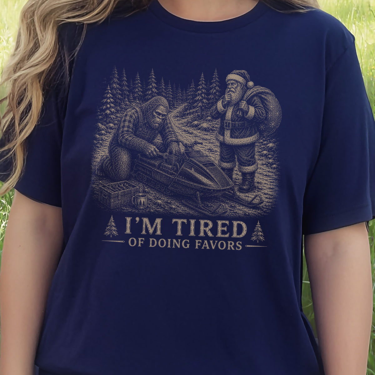 I’m Tired of Doing Favors T-Shirt – Bigfoot Fixing Santa Snowmobile Tee
