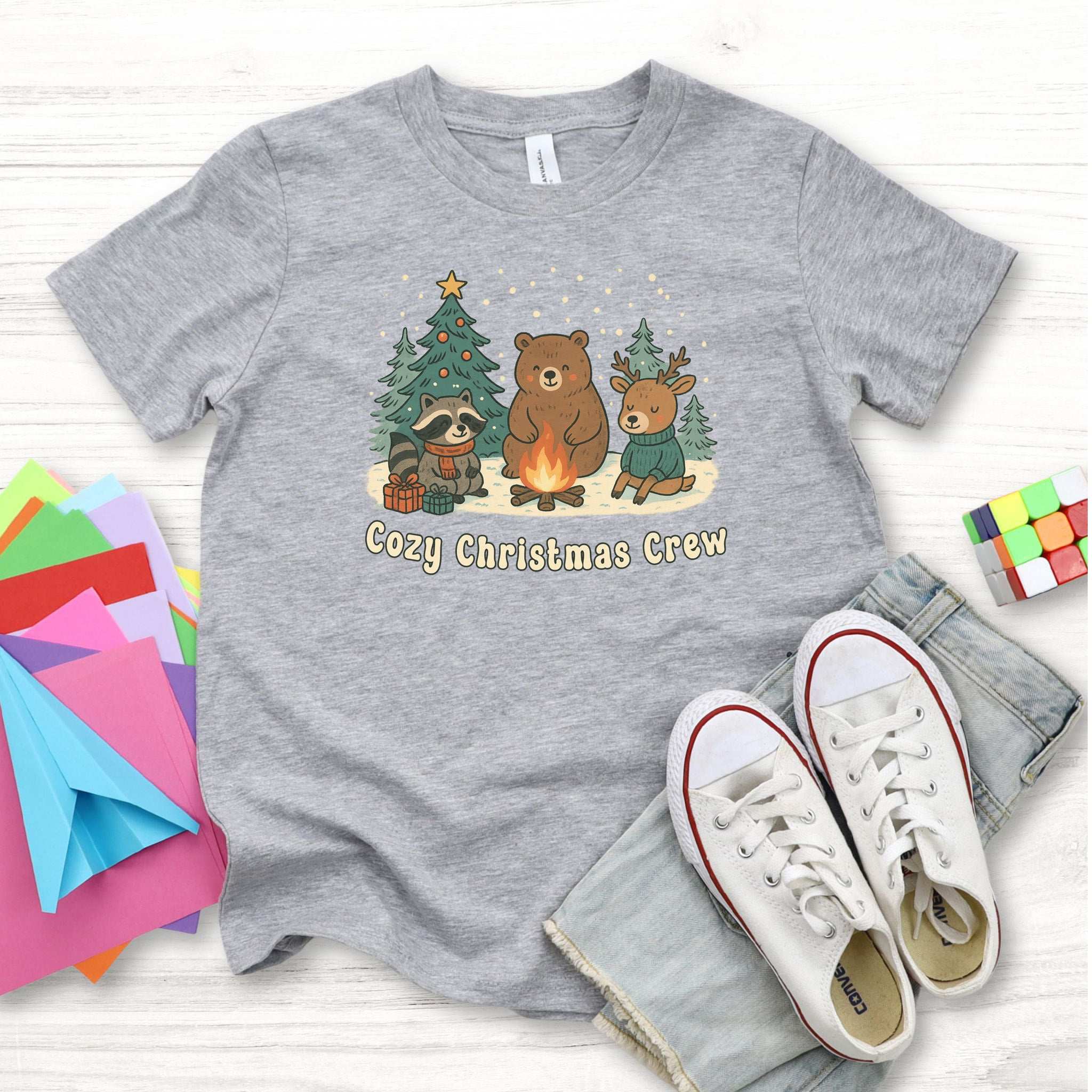 Cozy Christmas Crew Youth Tee – Cute Forest Animal Campfire Shirt