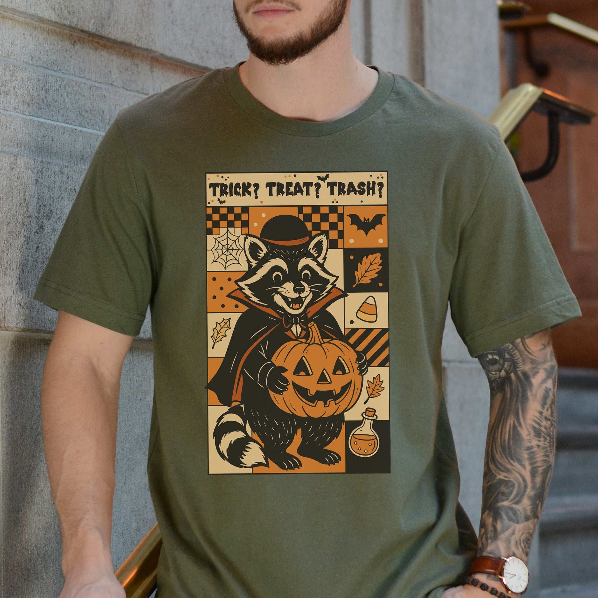 Dracula Raccoon Halloween T-shirt featuring retro design with pumpkin and spooky elements.