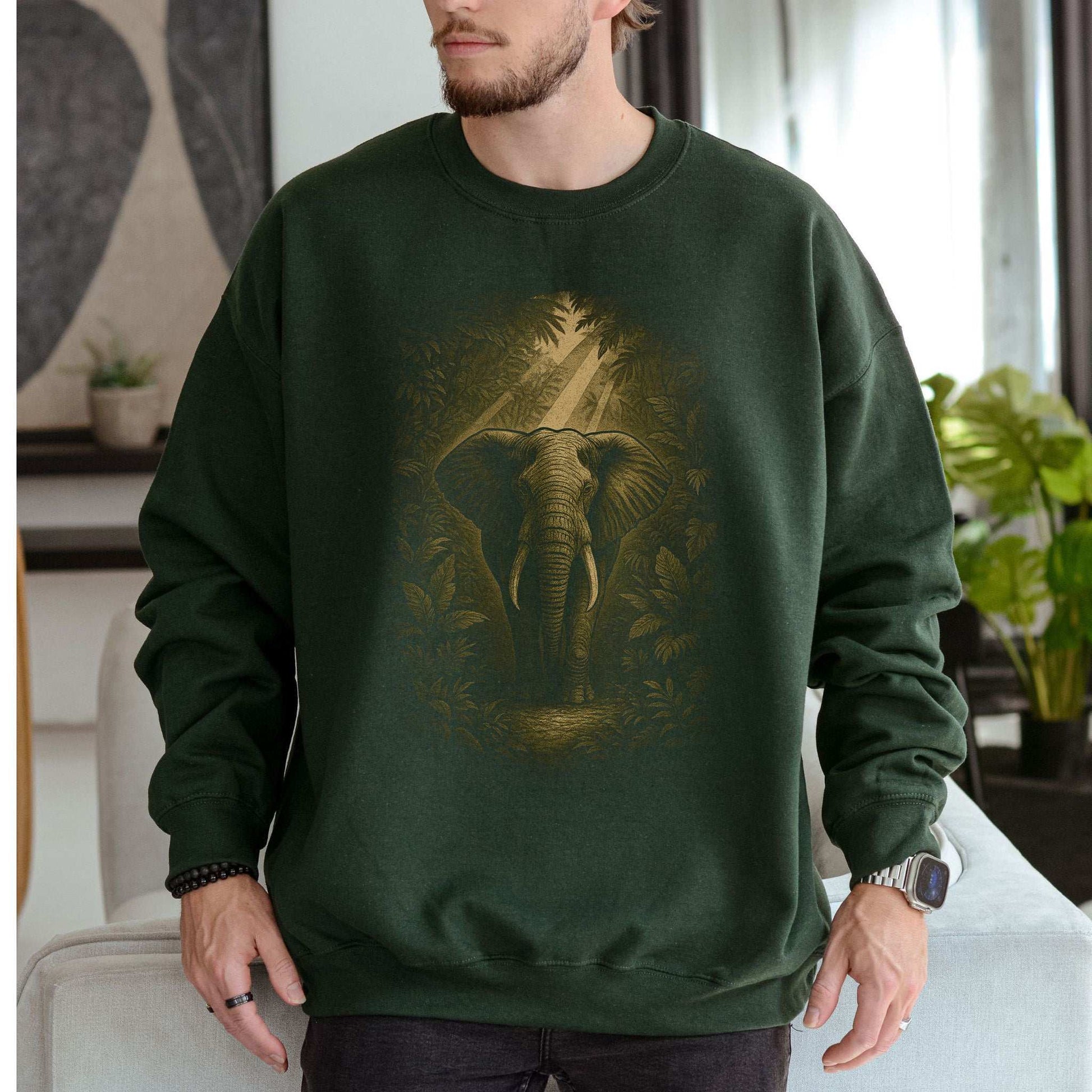 Elephant Spirit Animal Sweatshirt – Jungle Majesty & Safari Soul worn by a man in a green sweatshirt featuring an elephant design.