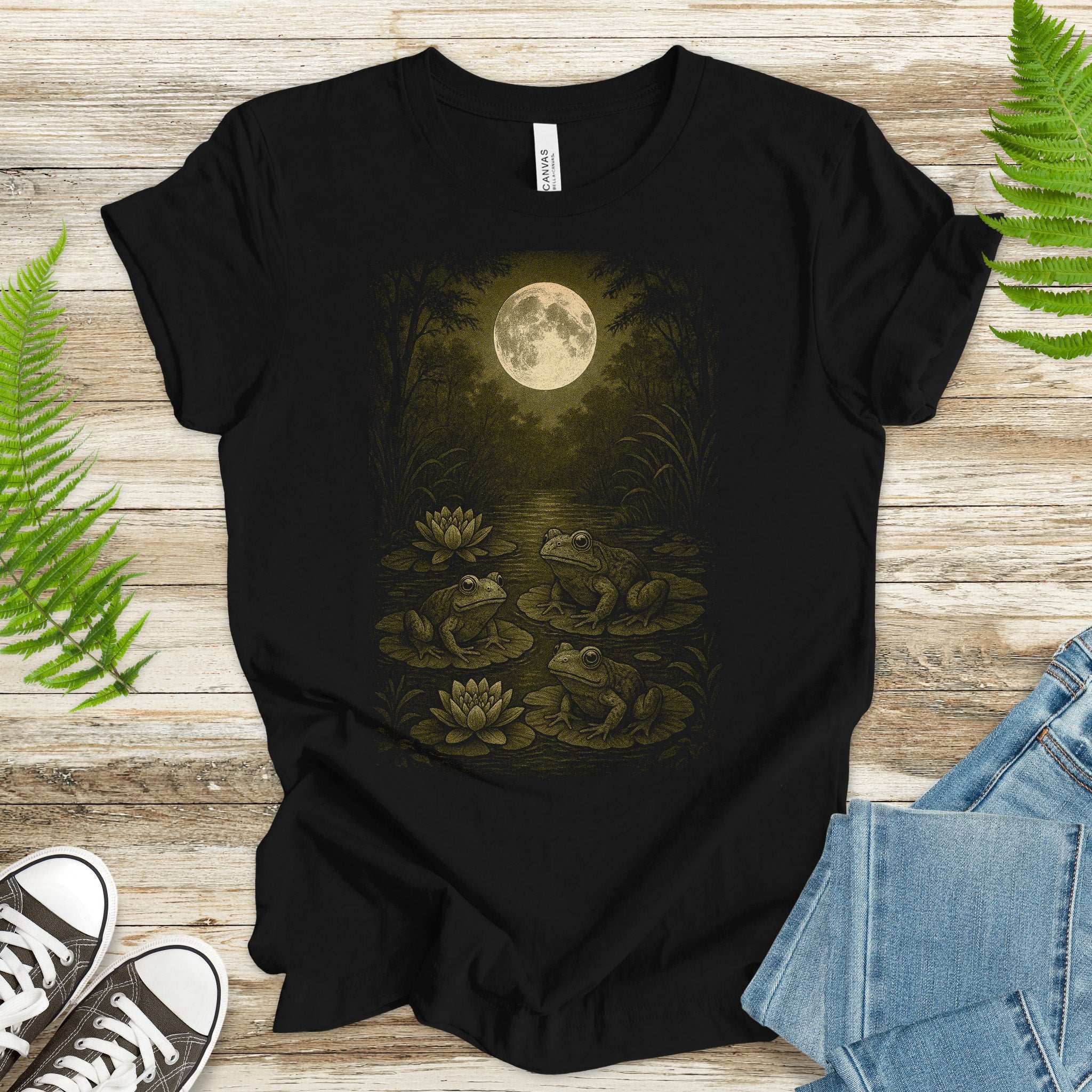 Frog Spirit Animal T-Shirt – Moonlit Pond & Forestcore Vibes featuring frogs and a full moon over lily pads.