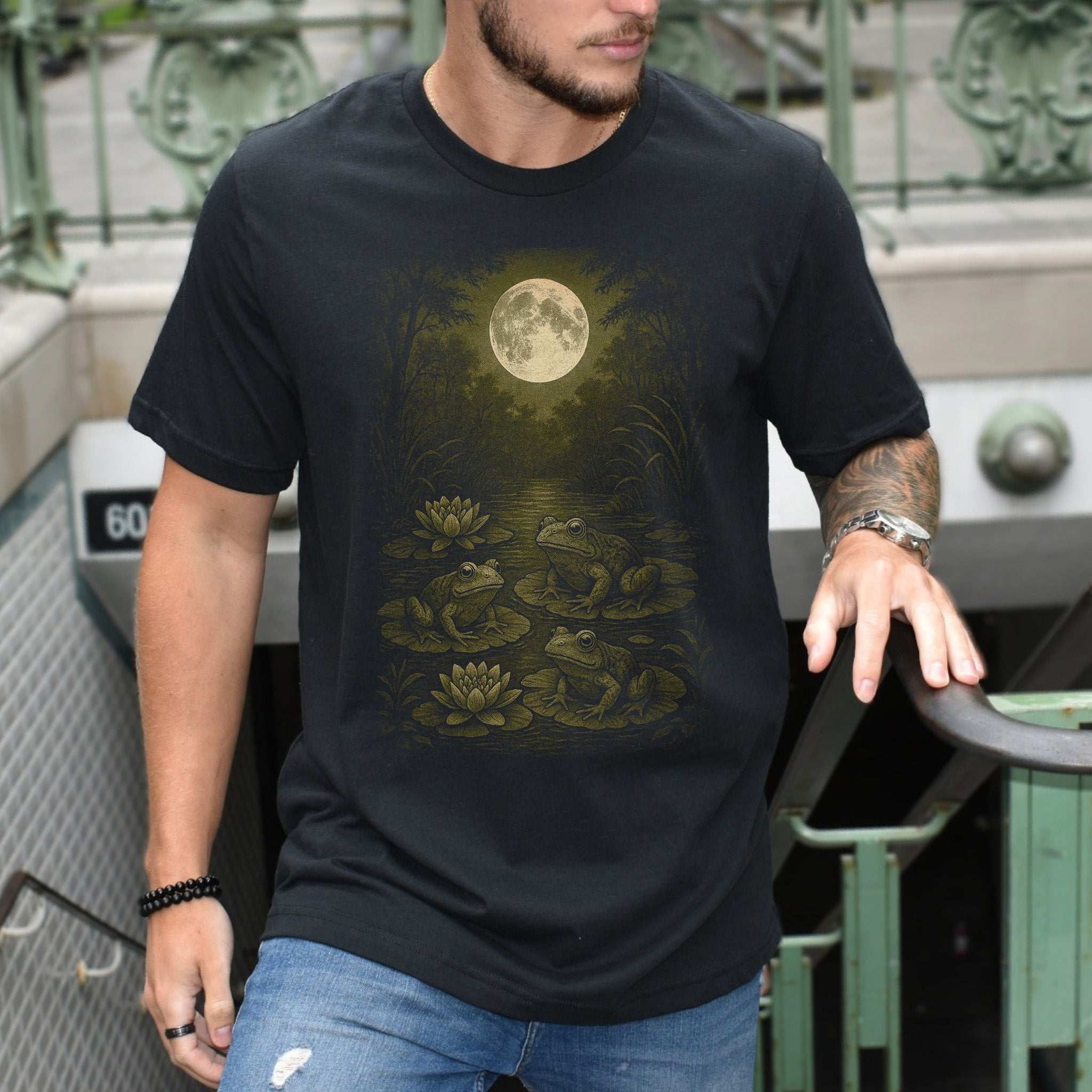 Frog Spirit Animal T-Shirt – Moonlit Pond & Forestcore Vibes featuring frogs under a full moon on a serene pond.