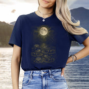 Frog Spirit Animal T-Shirt – Moonlit Pond & Forestcore Vibes featuring frogs and a full moon over a pond.