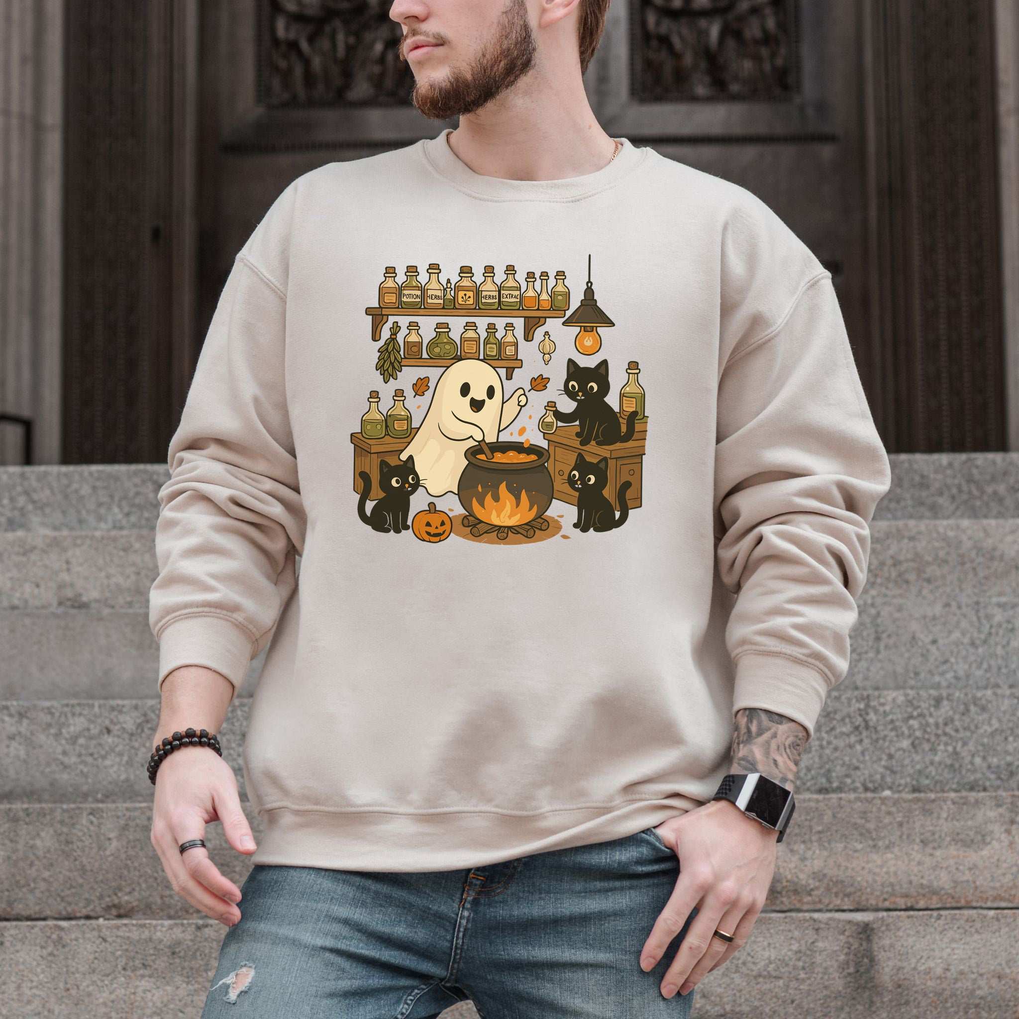 Ghost & Black Cats Cooking Halloween Sweatshirt with a retro ghost and adorable black cats brewing potions.