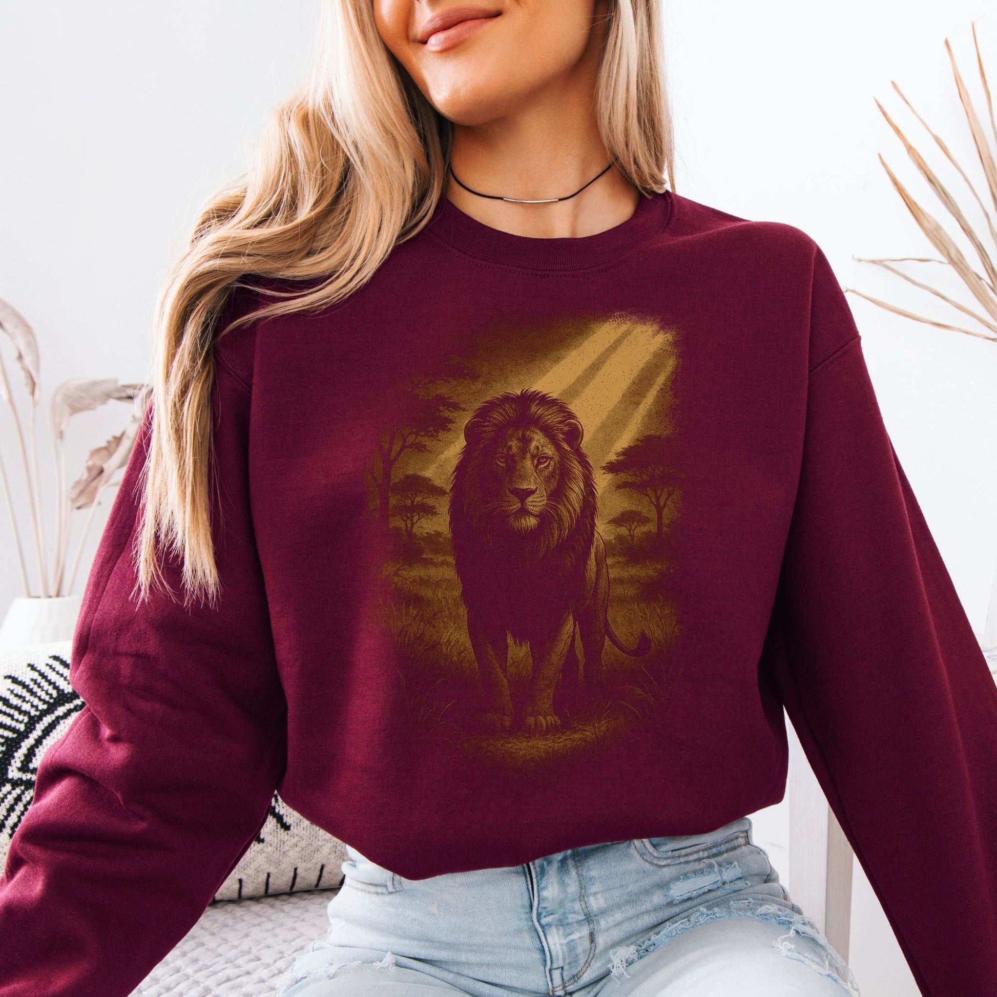 Lion Spirit Animal Sweatshirt – Golden Savannah King Vibes featuring a lion graphic in a warm atmosphere.