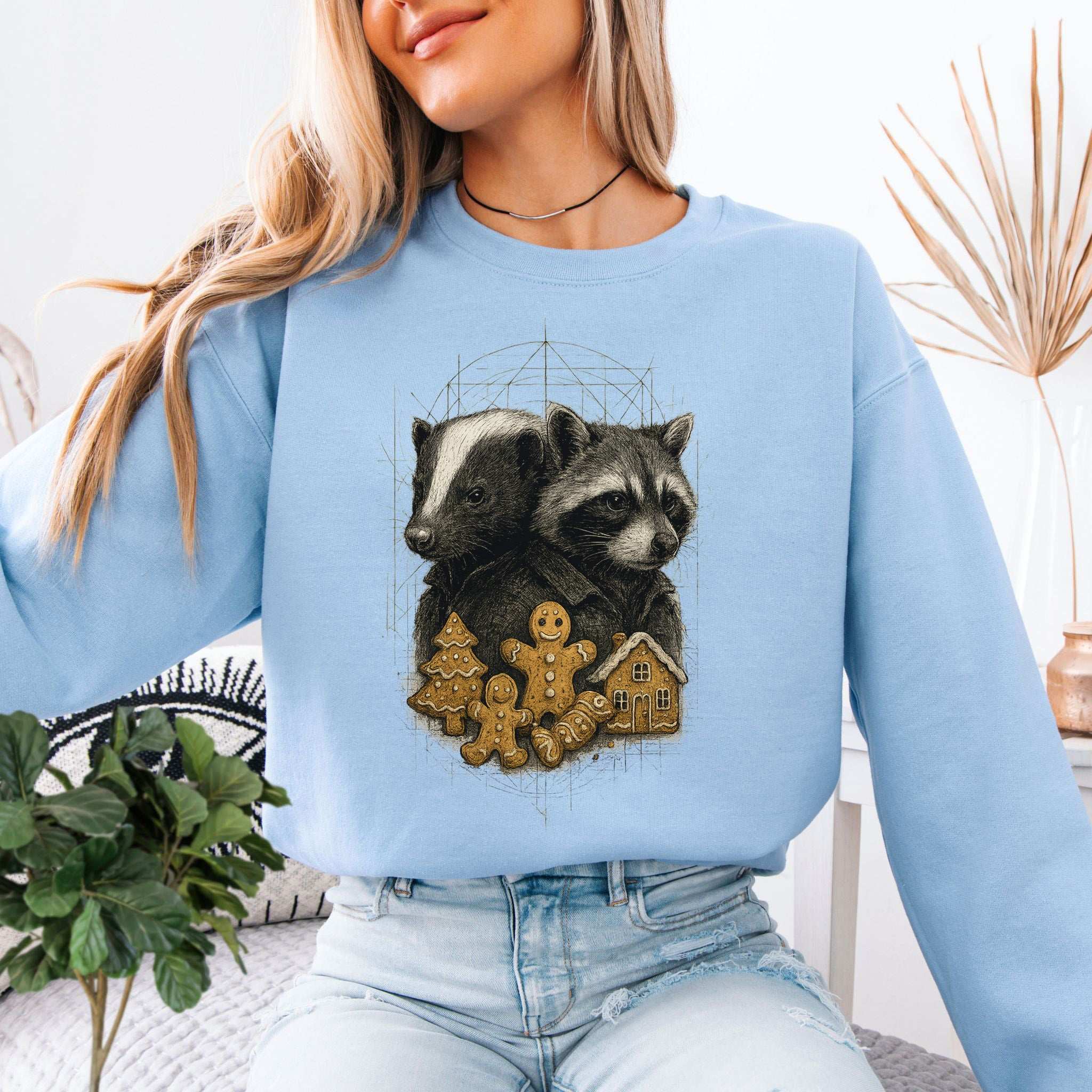 Skunk & Raccoon Christmas Sweatshirt – Gingerbread Mischief & Forest Charm