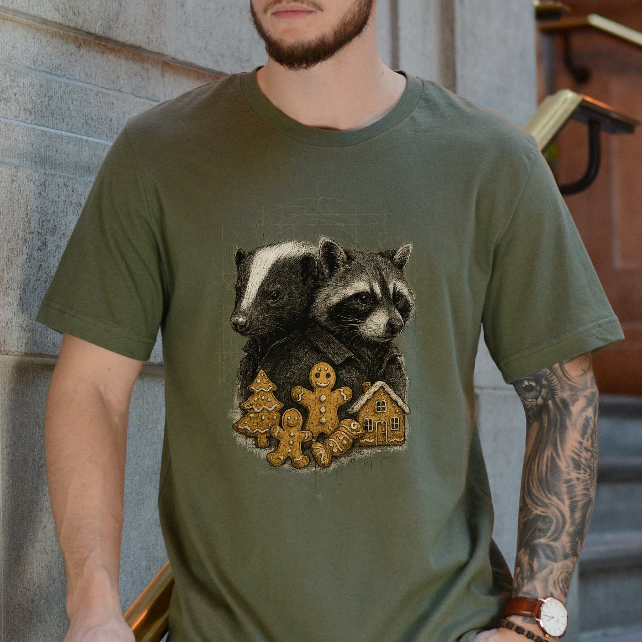 Skunk & Raccoon Christmas T-Shirt – Gingerbread Mischief & Forest Charm