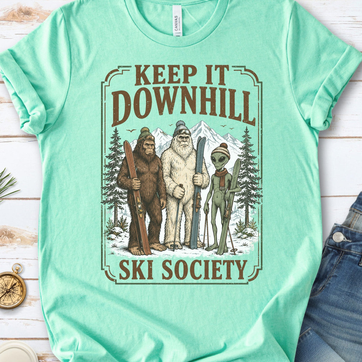 Keep It Downhill Cryptid Ski Society Bigfoot Yeti Alien Winter T-Shirt