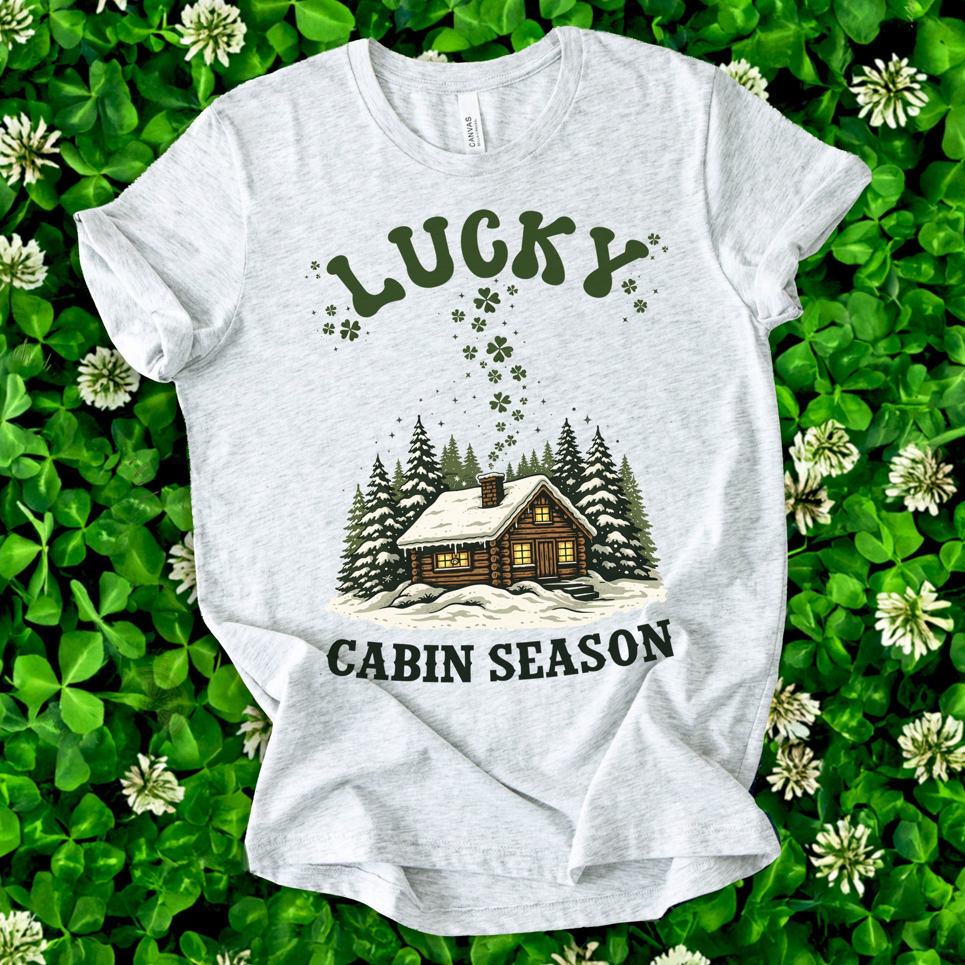 Lucky Cabin Season T-Shirt – Cozy Snowy Forest Tee for St. Patrick’s Day