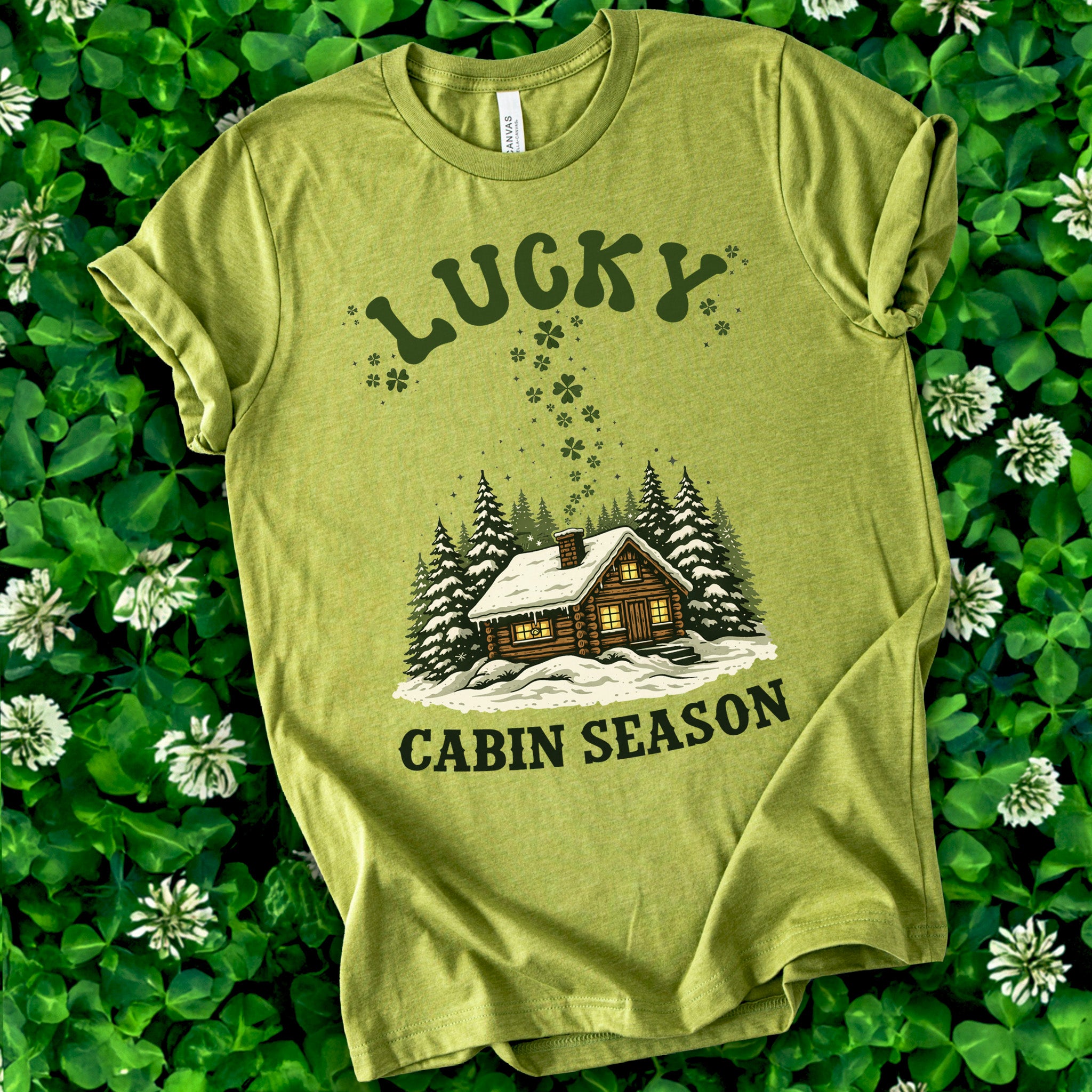 Lucky Cabin Season T-Shirt – Cozy Snowy Forest Tee for St. Patrick’s Day