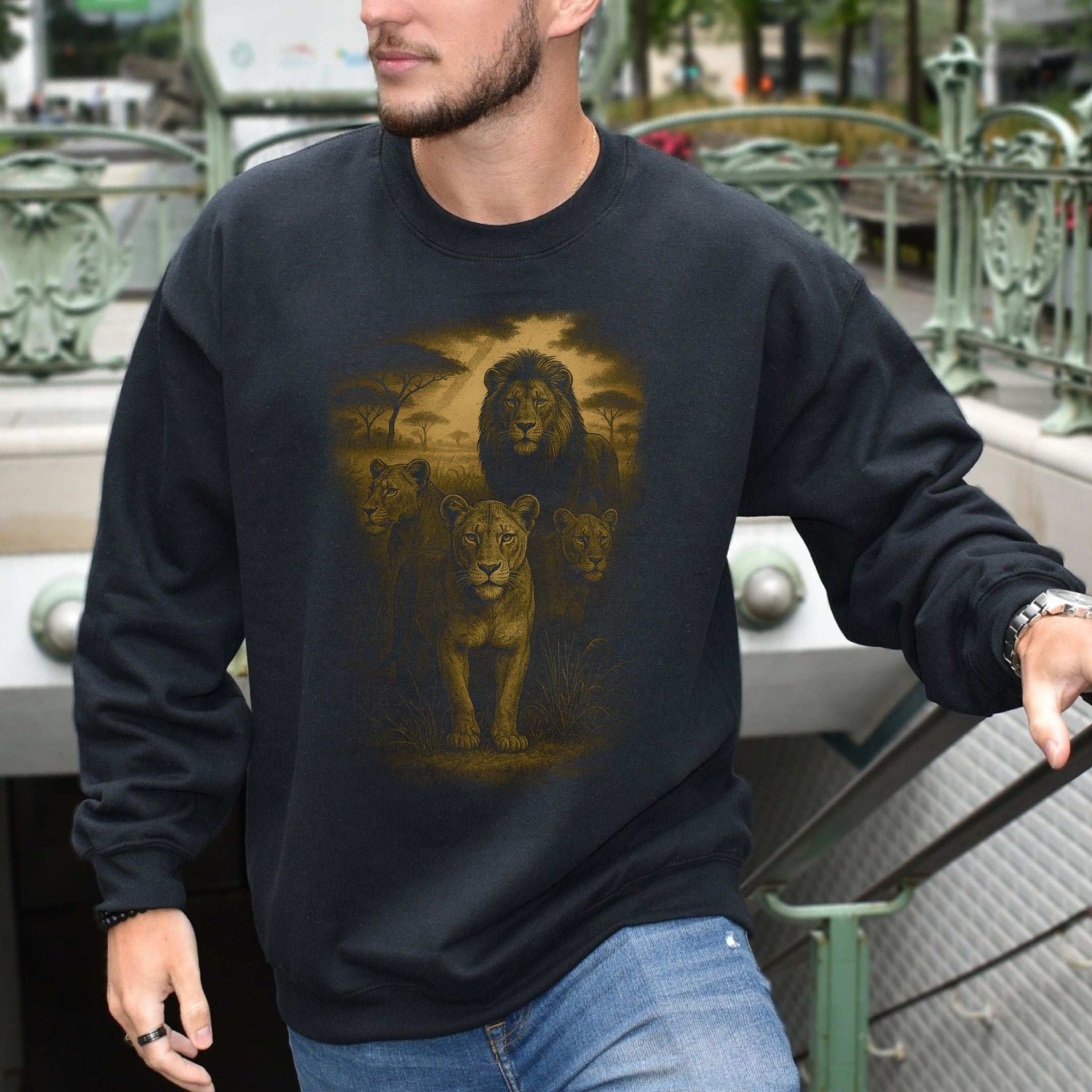 Lioness Spirit Animal Sweatshirt – Savannah Strength & Wild Sisterhood worn by a man with lions in the design, showcasing strength and wild energy.