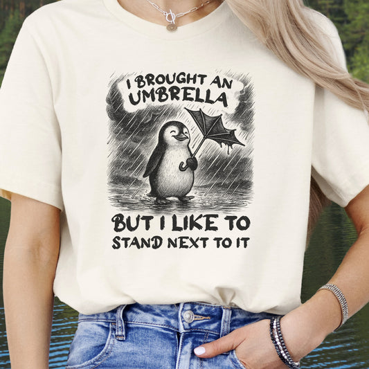 Penguin with Useless Umbrella T-Shirt – Funny Rainy Day Animal Tee