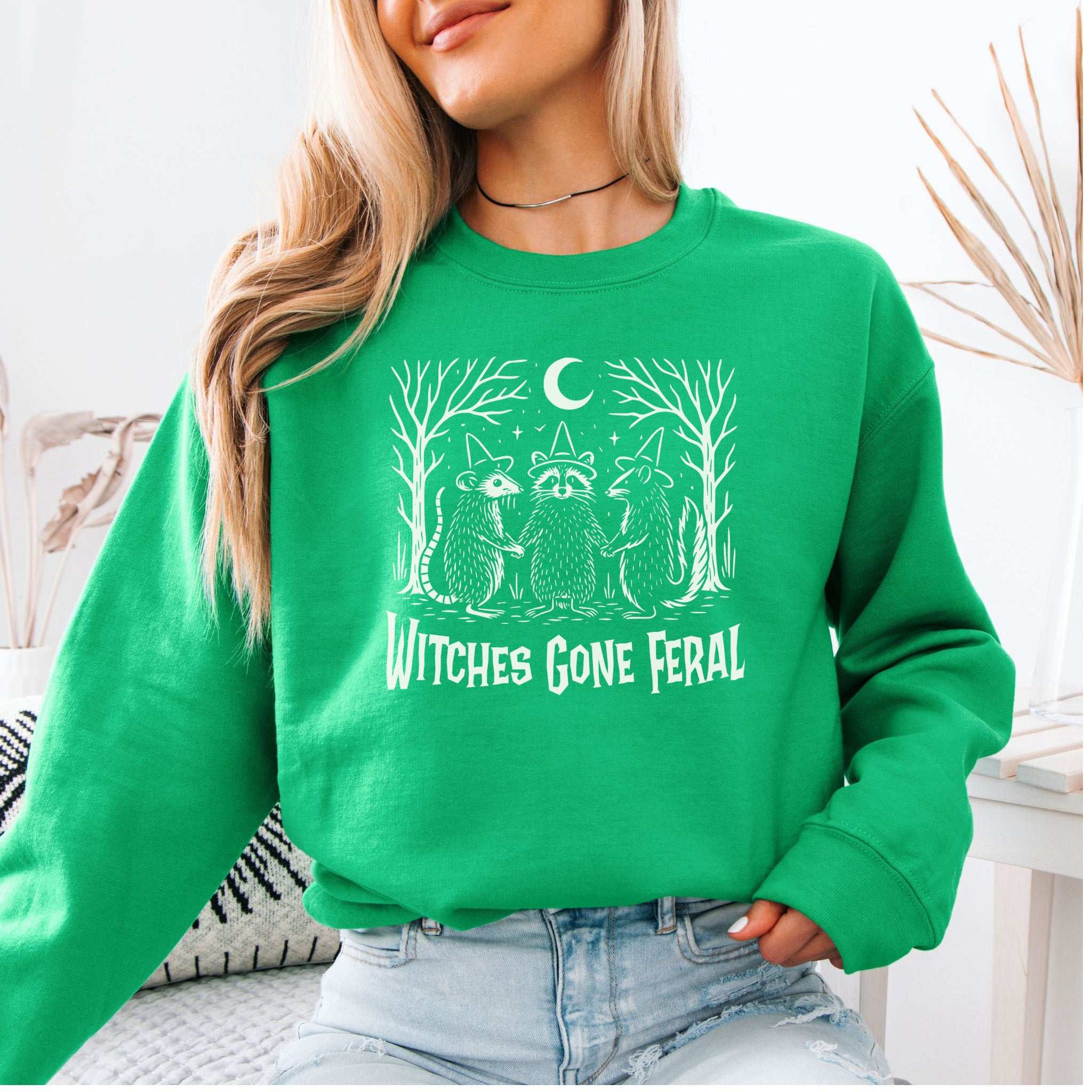 Witches Gone Feral Halloween Sweatshirt – Raccoon, Opossum & Skunk Coven Vibes