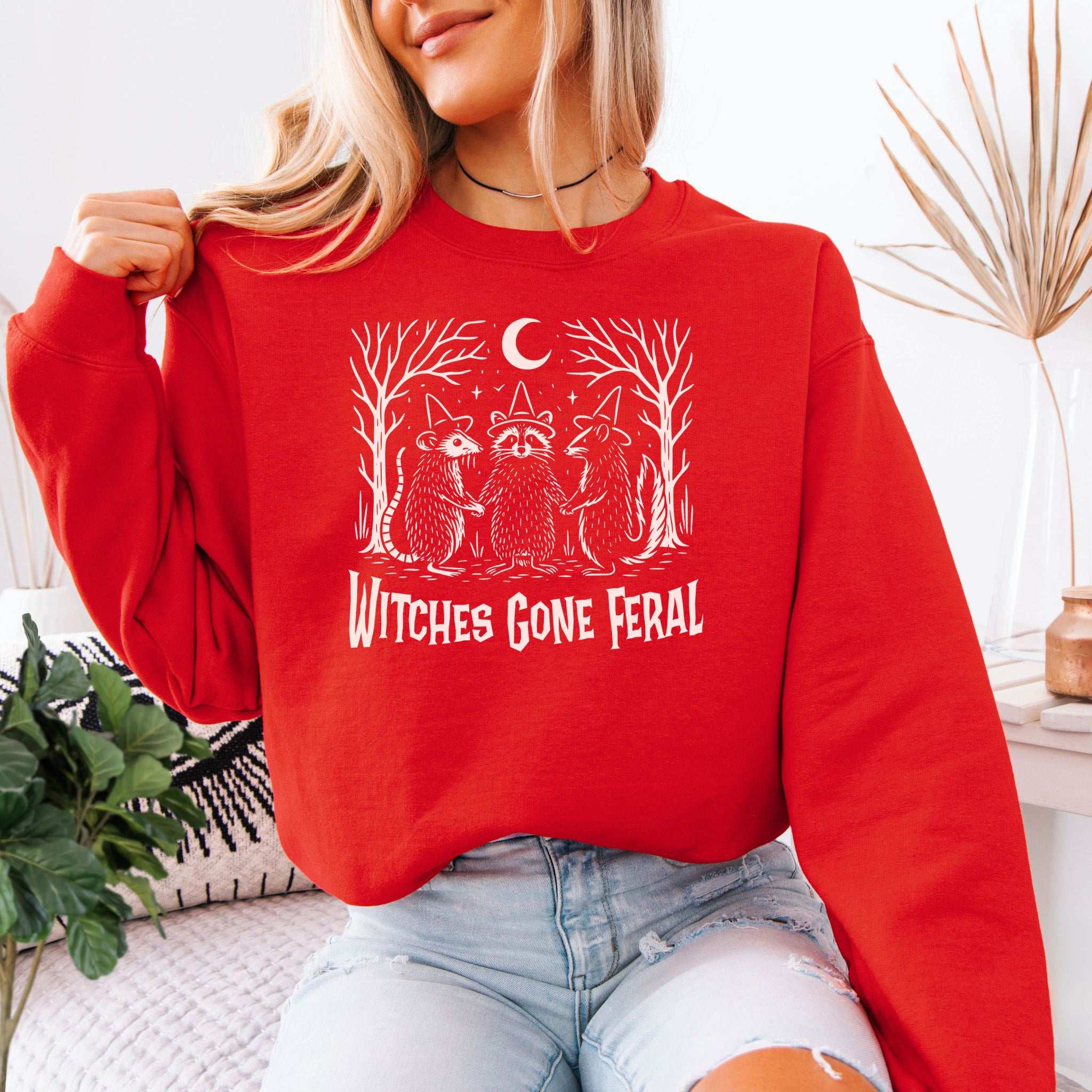Witches Gone Feral Halloween Sweatshirt – Raccoon, Opossum & Skunk Coven Vibes