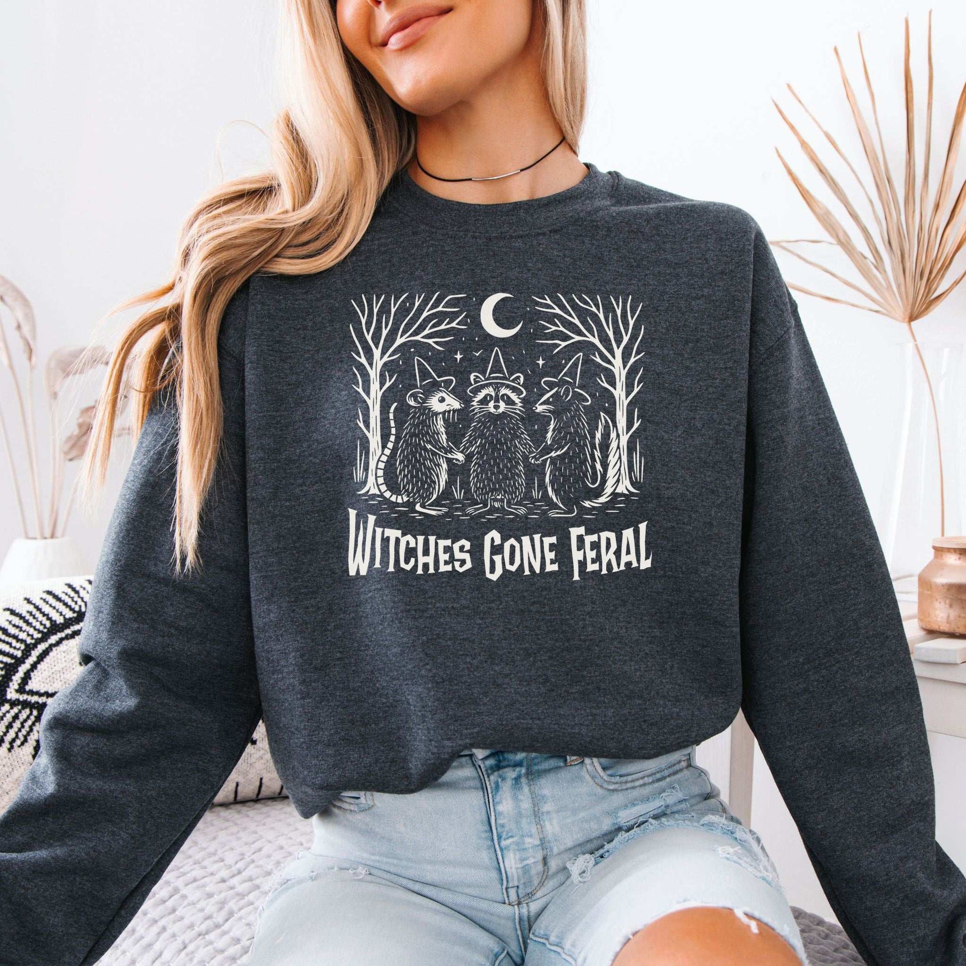 Witches Gone Feral Halloween Sweatshirt – Raccoon, Opossum & Skunk Coven Vibes