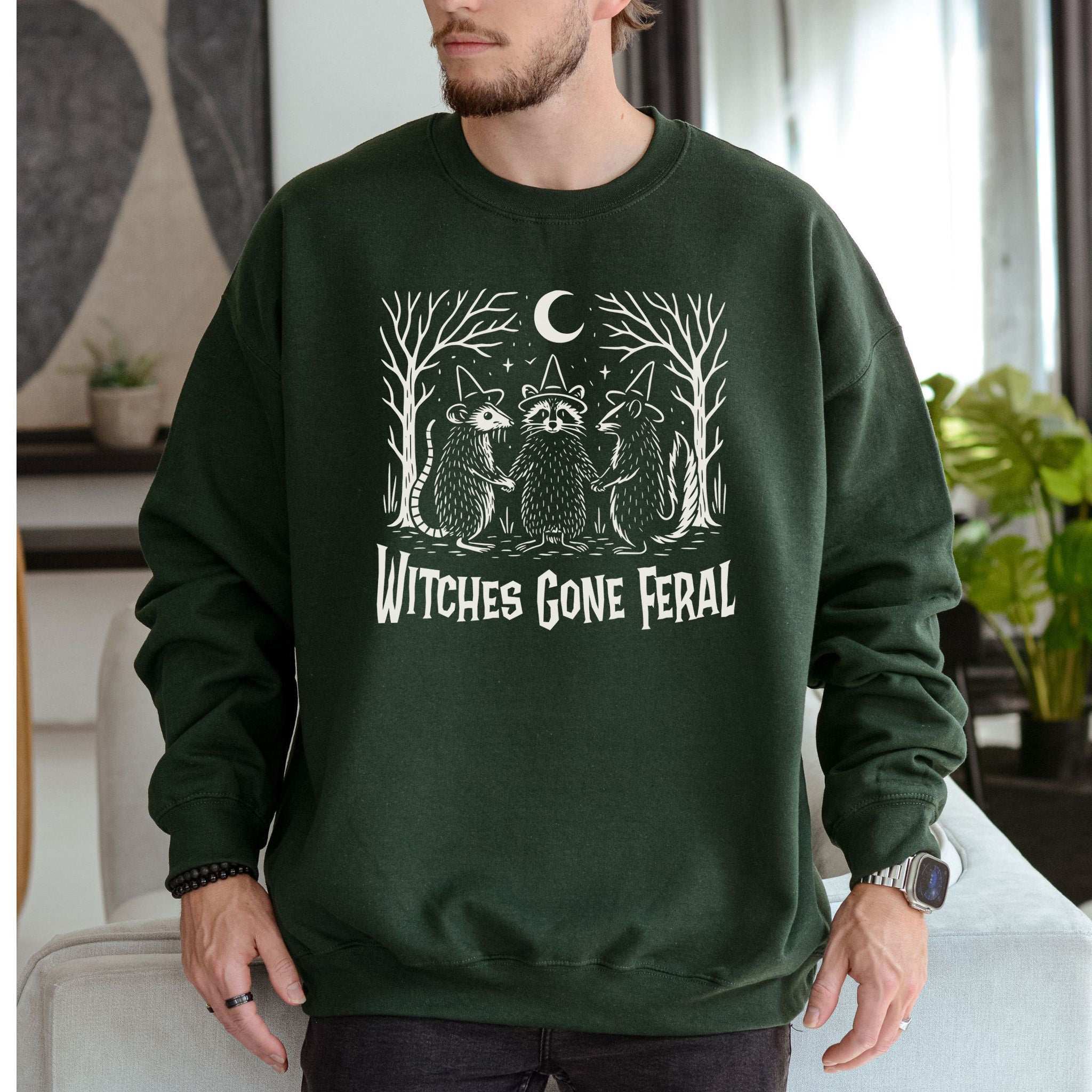 Witches Gone Feral Halloween Sweatshirt – Raccoon, Opossum & Skunk Coven Vibes