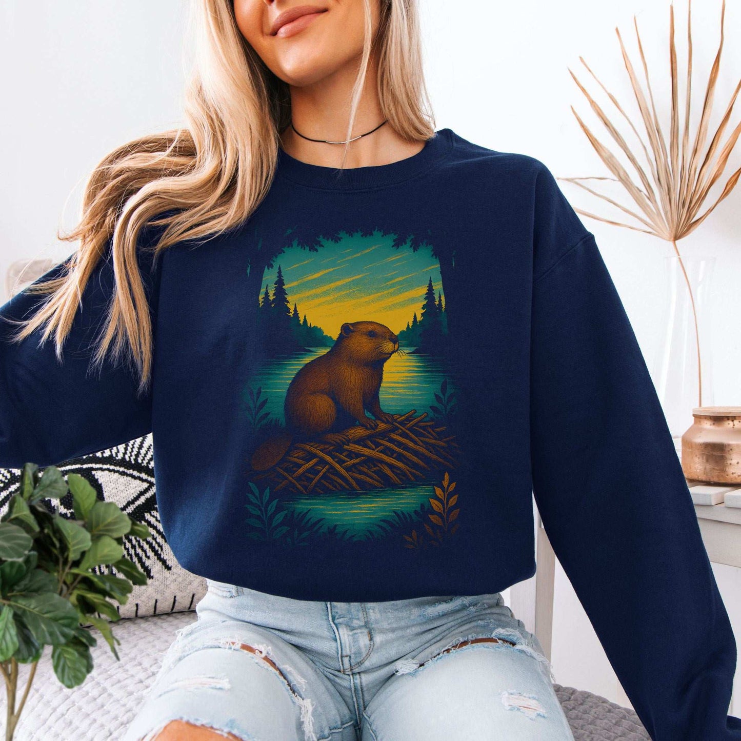 Beaver Spirit Animal Sweatshirt – Sunset Dam Builder Vibes featuring a beaver on a dam with vibrant sunset colors.